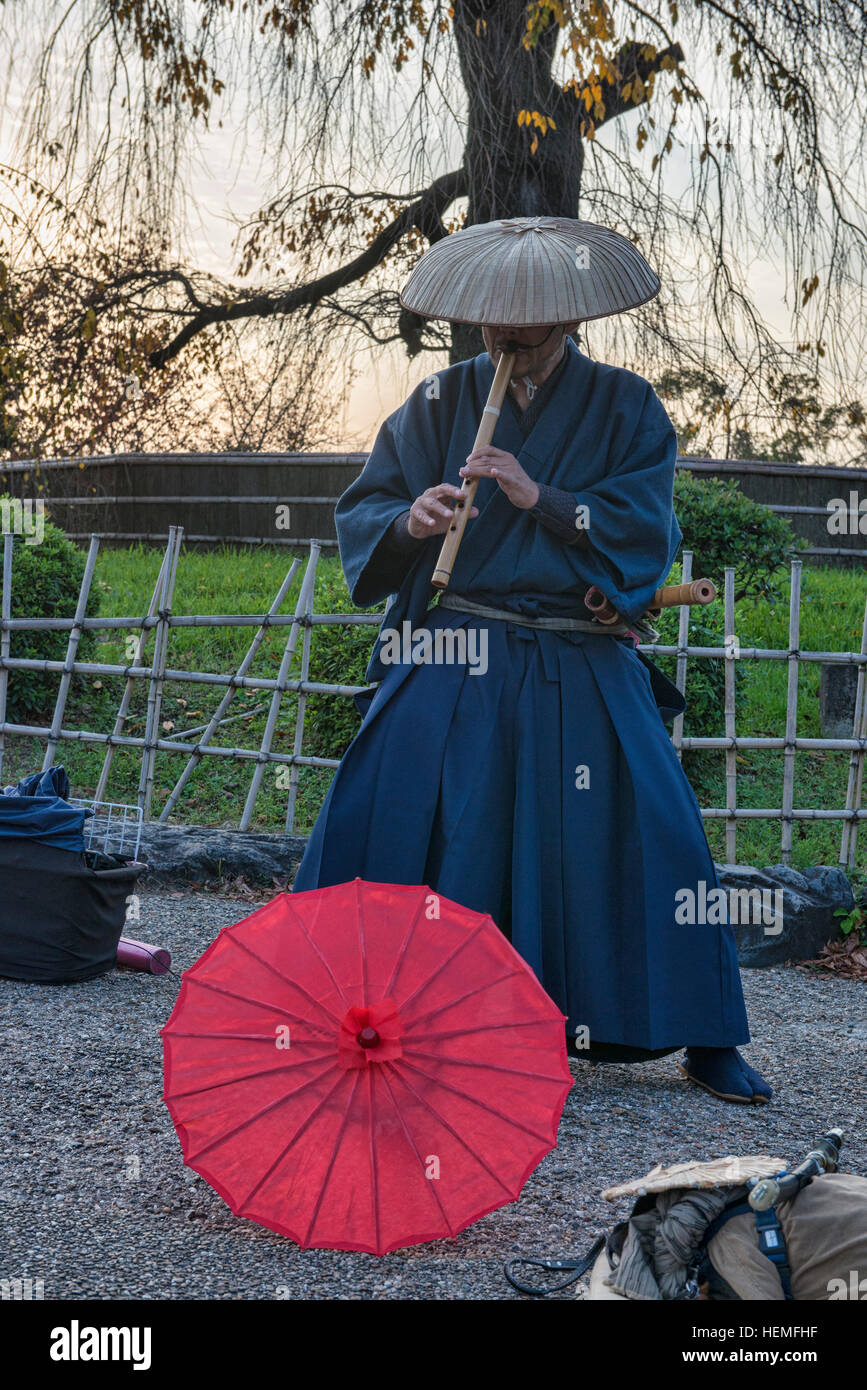 Fuke Zen performer playing a shakuhachi bamboo flute in Higashiyama
