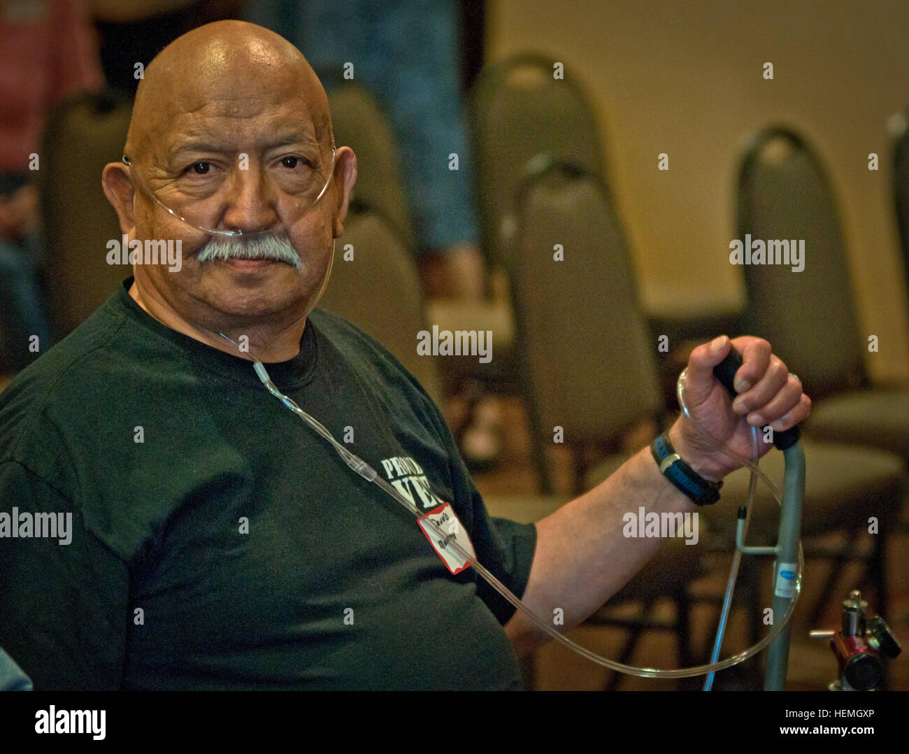 KILLEEN, Texas -- Vietnam veteran Dennis Montoya, who served combat tours in 1967 and 1968 as a specialist for Company D, 1st Battalion, 5th Cavalry Regiment, 1st Cavalry Division, takes a break during the third reunion of Vietnam Veterans from 'The D 1-5' on April 17, 2013. (U.S. Army photo by Sgt. Ken Scar, 7th Mobile Public Affairs Detachment) 1st Bn., 5th Cav. soldiers host their Vietnam-era brothers on Fort Hood 130417-A-ZU930-028 Stock Photo