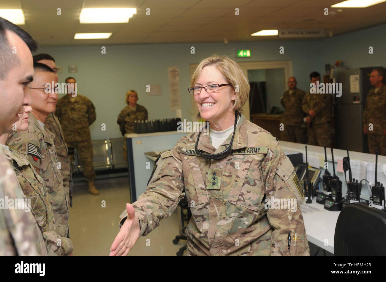 U.S. Army Lt. Gen. Patricia Horoho, center, the 43rd Army surgeon general, greets Service members at Kandahar Airfield's Role 3 hospital in Kandahar province, Afghanistan, April 18, 2013.  (U.S. Army photo by Sgt. Ashley Bell/Released) Service Surgeon Generals visit RC-South 130418-A-VM825-060 Stock Photo