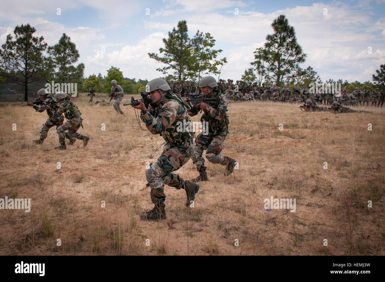 Indian Army soldiers with the 99th Mountain Brigade’s 2nd Battalion, 5th Gurkha Rifles, execute an ambush for paratroopers with the U.S. Army’s 1st Brigade Combat Team, 82nd Airborne Division, May 7, 2013, at Fort Bragg, N.C.  The soldiers are participating in Yudh Abhyas, an annual bilateral training event between the armies of the United States and India sponsored by U.S. Army Pacific.  (U.S. Army photo by Sgt. Michael J. MacLeod) Yudh Abhyas 2013, 2nd Batallion, 5th Gurkha Rifles Stock Photo