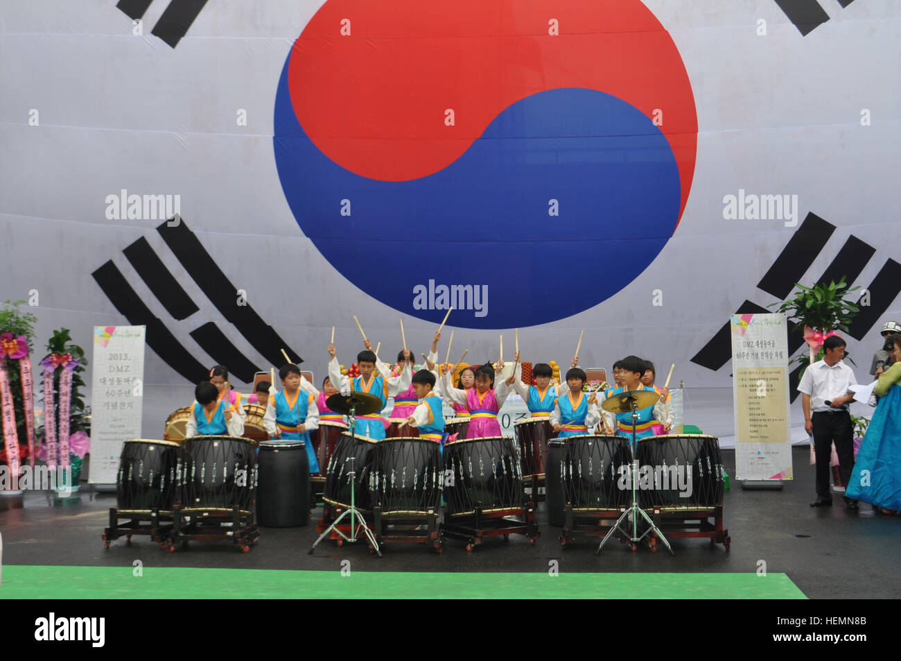 Taeseongdong Elementary School percussion band performs during the Taeseongdong Village 60th anniversary celebration in the Joint Security Area of the Demilitarized Zone, South Korea, Aug. 2, 2013. The ceremony marked the establishment of the small village, known as 'Freedom Village,' after the signing of the Korean War Armistice in 1953. (U.S. Army photo by Capt. Kelly E. McKenzie, 210th Fires Brigade Public Affairs Officer/Released) Col. Lawson visits Taeseongdong 130802-A-TN121-089 Stock Photo