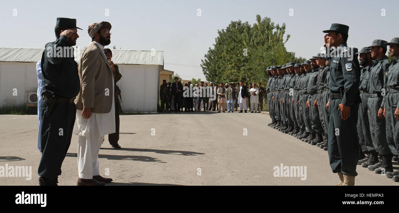 The governor of Paktika province, Moheebullah Samim addresses a graduating class of approximately 70 Afghan Local Police prior to their graduation ceremony held at the National Directorate of Security compound adjacent to Forward Operating Base Rushmore, Afghanistan, Aug. 28, 2013. This graduating class marks the first all Afghan instructed police training to take place in Paktika province.  The ALP is an effective, cost efficient, resilient, and accountable component of GIRoA security forces as they provide security to the local populace. The relevance of the ALP is demonstrated by its recogn Stock Photo