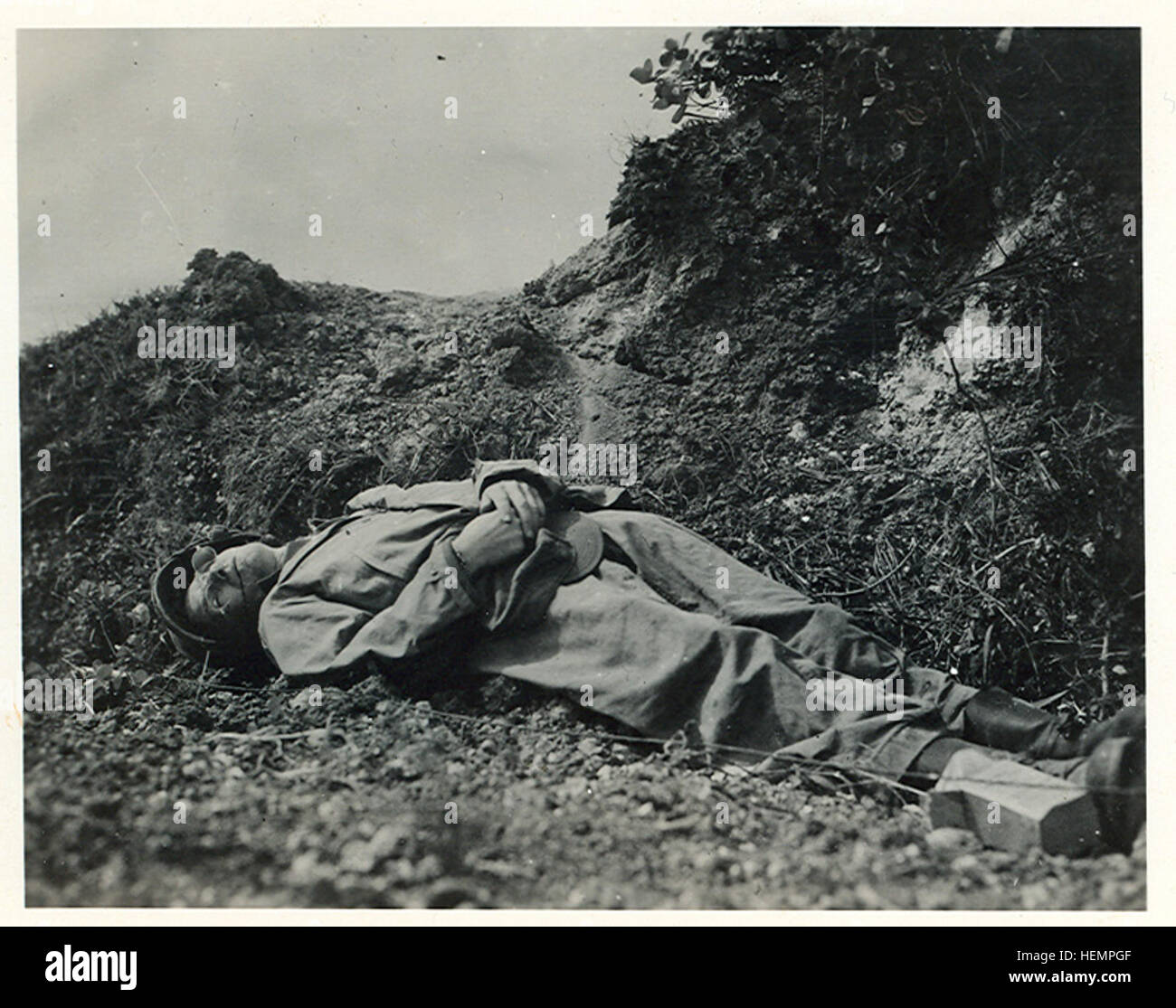 This photo provided by Richard Strasser, perhaps never before published, shows famed World War II war correspondent Ernie Pyle shortly after he was killed by a Japanese machine gun bullet on the island of Ie Shima on April 18, 1945. Pyle, 44, had just arrived in the Pacific after four years of writing his popular column from European battlefronts. The Army photographer who crawled forward under fire to make this picture later said it was withheld by military officials. An AP survey of history museums and archives found only a few copies in existence, and no trace of the original negative.  (AP Stock Photo