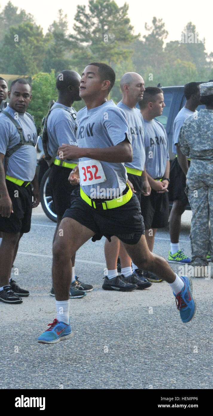 Pfc. Jonathan Echavez, a rigger with 11th Quartermaster Company, 264th Combat Sustainment Support Battalion, and a New York City native, sprints to first place during the 330th Transportation Battalion Army Physical Fitness Test competition during Provider Week at Wright Field Sept. 10. Providers compete in physical fitness 130910-A-QD996-003 Stock Photo