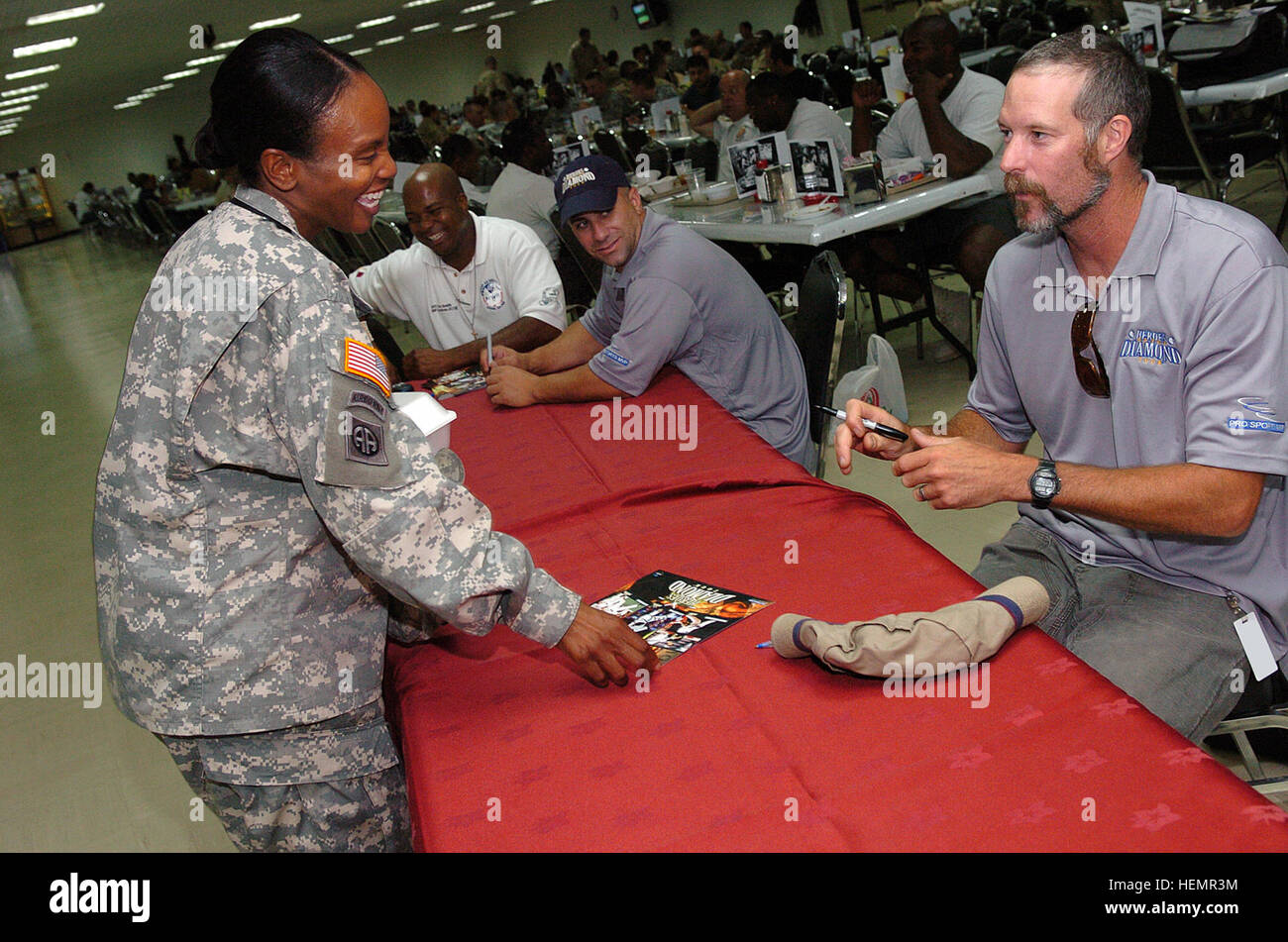 “I am a huge baseball fan!” said U.S. Army Lt. Col. Sheila Bryant, from Fayetteville, N.C., to Jack McDowell, a retired Major League Baseball pitcher, at Camp As Sayliyah in Qatar on Sept. 27, 2007. During his 13-year career, McDowell was commonly known as “Black Jack” by his teammates because of his dark beard. “Black Jack was a powerful pitcher,” said Bryant. McDowell and two other professional baseball athletes visited troops in Qatar and Afghanistan during their Heroes of the Diamond tour. Jack McDowell Qatar 2 Stock Photo