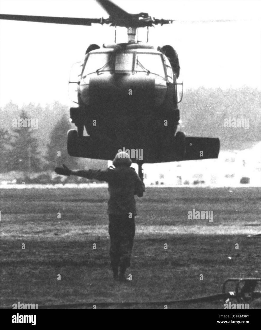 A UH-60 being guided into the hot refueling point Stock Photo - Alamy