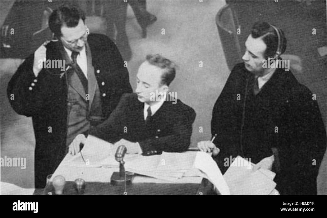 Attorneys Bergold and Aschenauer with Prosecutor Ferencz at the Einsatzgruppen Trial Stock Photo