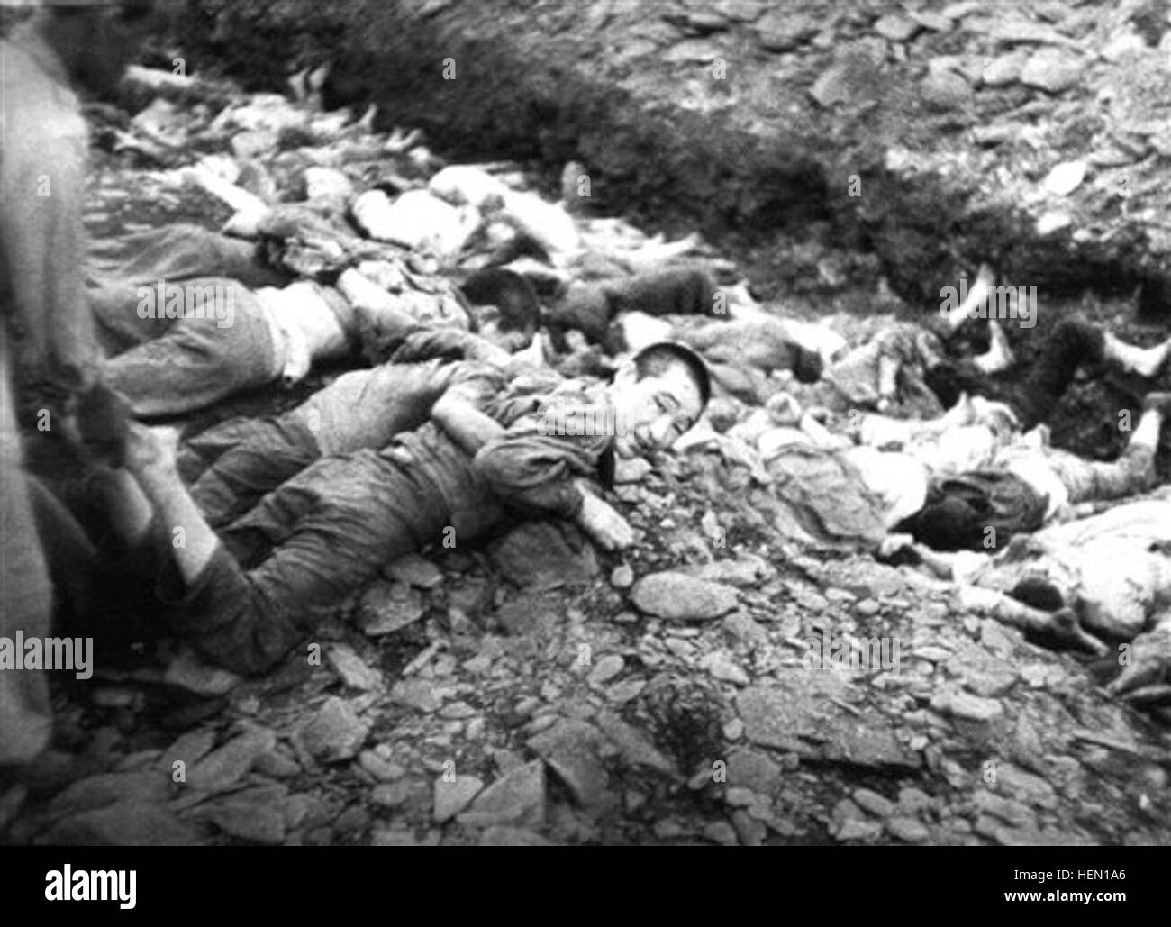 FILE - In this July 1950 U.S. Army file photograph once classified 'top secret,' prisoners lie on the ground before their execution by South Korean troops in Taejon, South Korea. Shutting down its inquiry into South Korea's hidden history, a government commission investigating a century of human rights abuses will leave unexplored scores of suspected mass graves believed to hold remains of tens of thousands of South Korean political detainees summarily executed by their government early in the Korean War, sometimes as U.S. officers watched. In a political about-face, the commission, which also Stock Photo