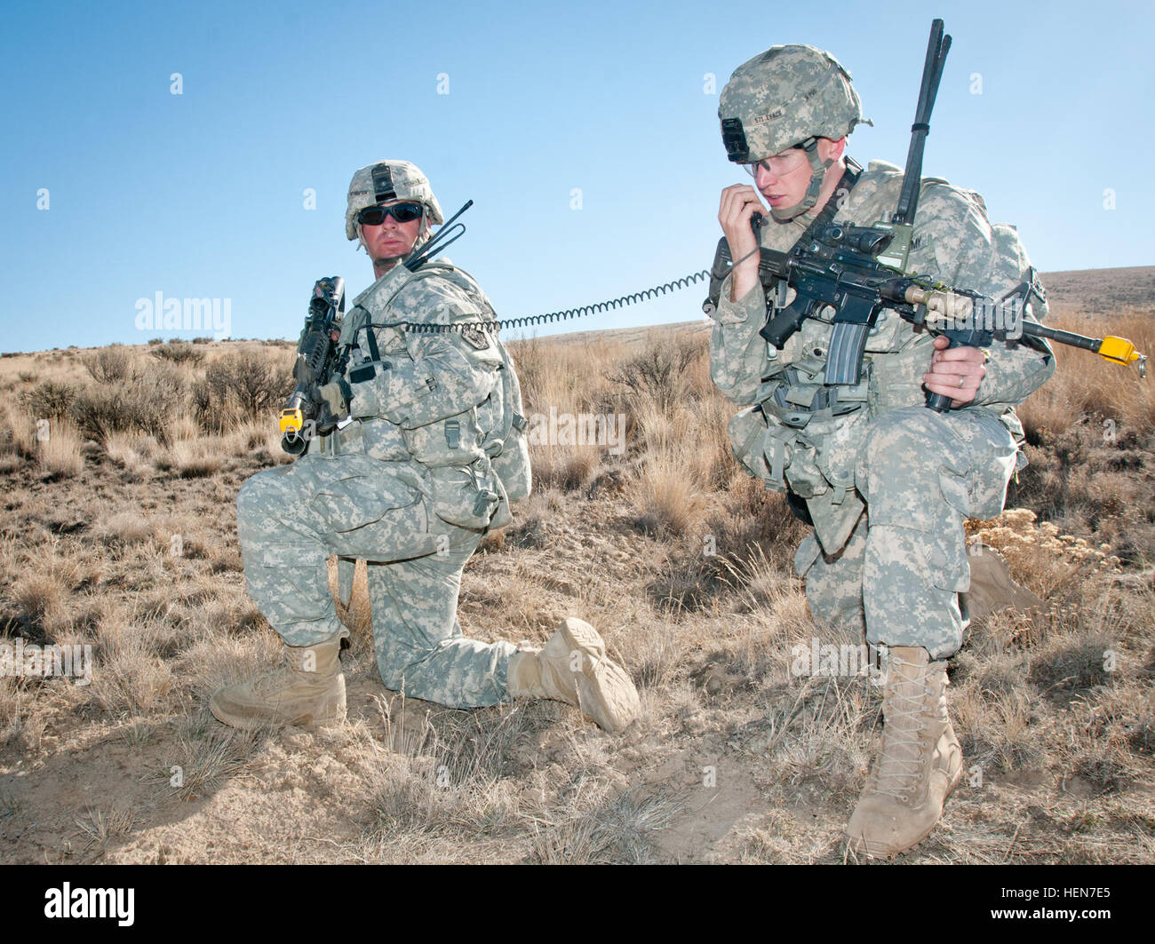 Sgt. William Thompson, pulls security while 2nd Lt. Travis Emery ...