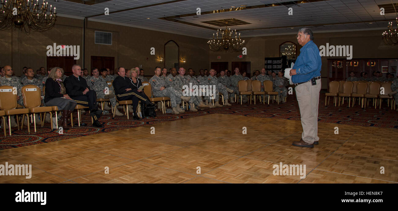 Paul 'Cowbone' Buster, a full-blood Seminole Native American, who is currently a Seminole language teacher for the Seminole Tribe of Florida education program, speaks to soldiers of the 3rd Infantry Division at the Club Stewart ballroom here, Nov., 13. Buster was here to speak to those in attendance about Native American Heritage. The event was held in recognition of National Native American Heritage Month, and was hosted by the 2nd Armored Brigade Combat Team. Cowbone is his Seminole name given to him by his father as a right of passage from boy to young man. The theme of the event was 'Guidi Stock Photo