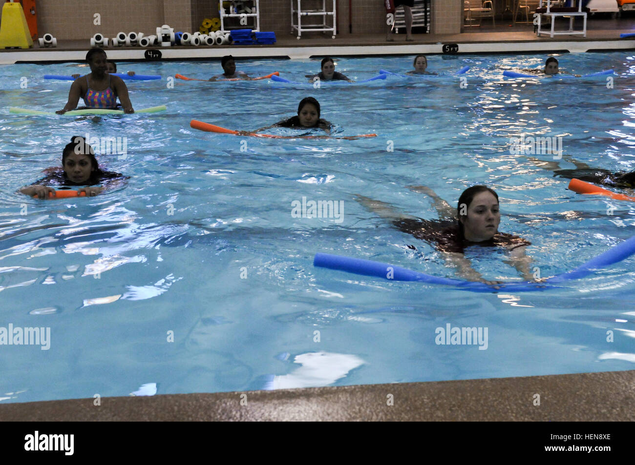 FORT CARSON, Colo. -- Participants in the Pregnancy Postpartum Physical  Training Program use swim noodles as part of their workout, Nov. 20, 2013.  As part of the P3T program swimming provides a