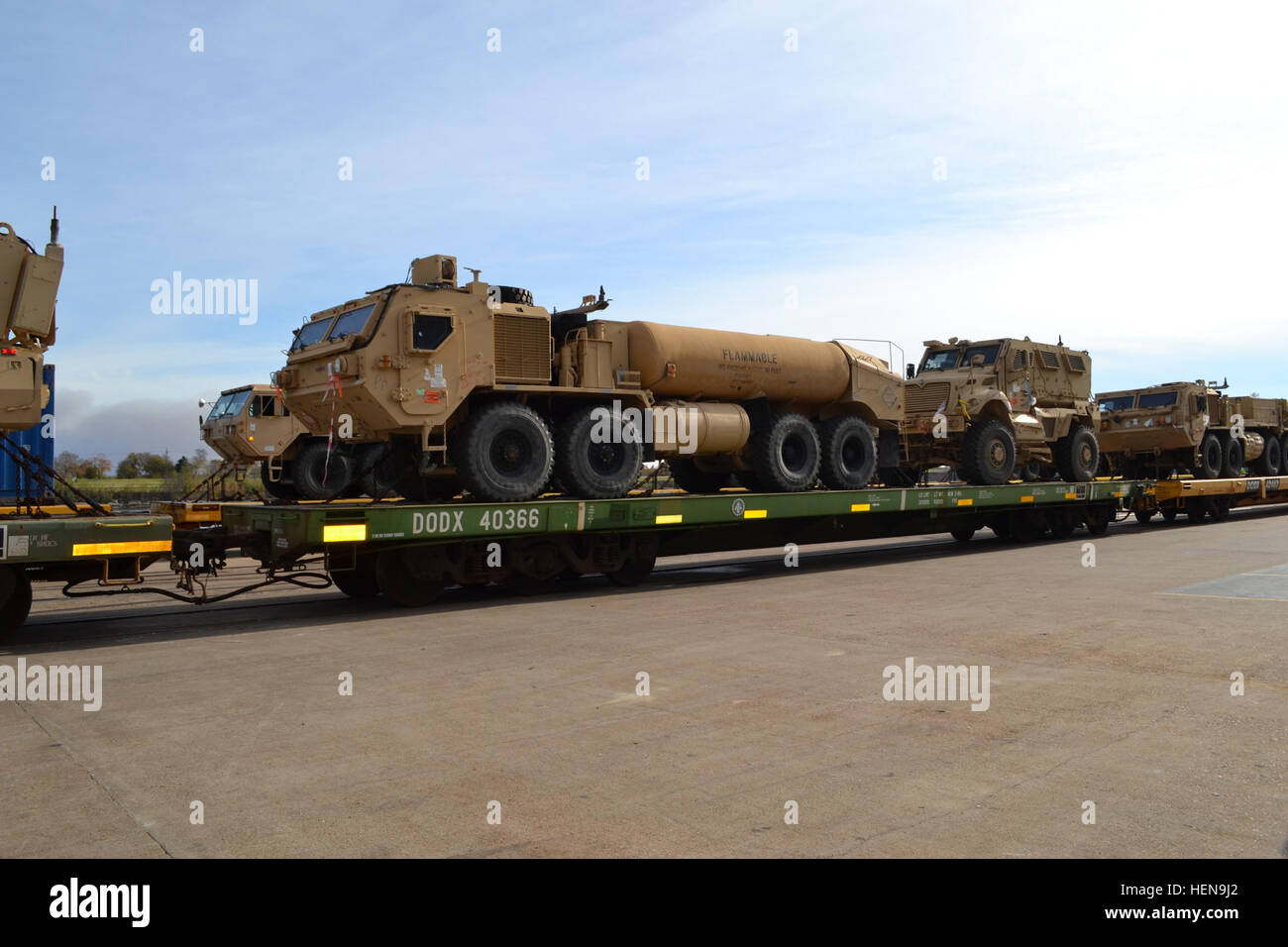 The 842nd Transportation Battalion, with the 597th Transportation Brigade, Military Surface Deployment and Distribution Command orchestrates simultaneous terminal operations for the loading of unit equipment headed overseas and the offloading of cargo returning from Afghanistan at the Port of Port Arthur, Texas, Dec. 12, 2013. (U.S. Army photo by Sarah Garner/Released) The 842nd Transportation Battalion, with the 597th Transportation Brigade, Military Surface Deployment and Distribution Command orchestrates simultaneous terminal operations for the loading of unit equipment 131212-A-TQ663-967 Stock Photo