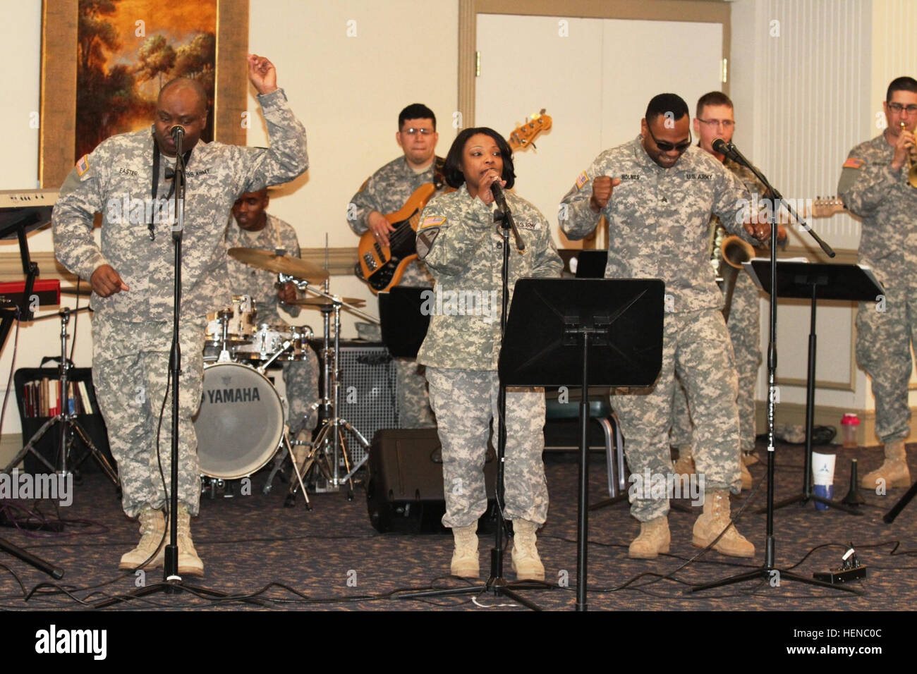 Soldiers sing along in unison with the 'Spur of the Moment' 1st Cavalry Division Jazz Band during the III Corps and 1st Air Cavalry Brigade, 1st Cav. Div.'s equal opportunity offices' 'Strength through Equality' Black History Month observance at Fort Hood, Texas, Feb. 21. During the ceremony, there were recitations of former slave narratives by the Viva Les Arts Theatre and a speech from Carlyle Walton, the president and CEO of Metroplex Adventist Hospital in Killeen, Texas. The event also featured a guest appearance from retired Lt. Col. Granville Coggs, one of an estimated 50 remaining Tuske Stock Photo
