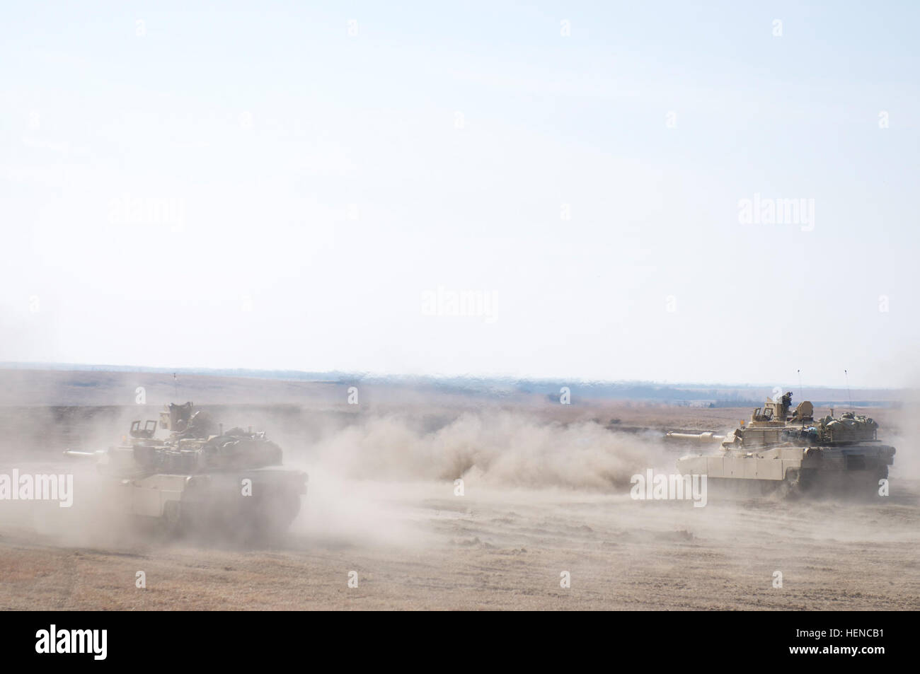 M1A2 Abrams tanks from 2nd Battalion, 34th Armor Regiment conduct live ...