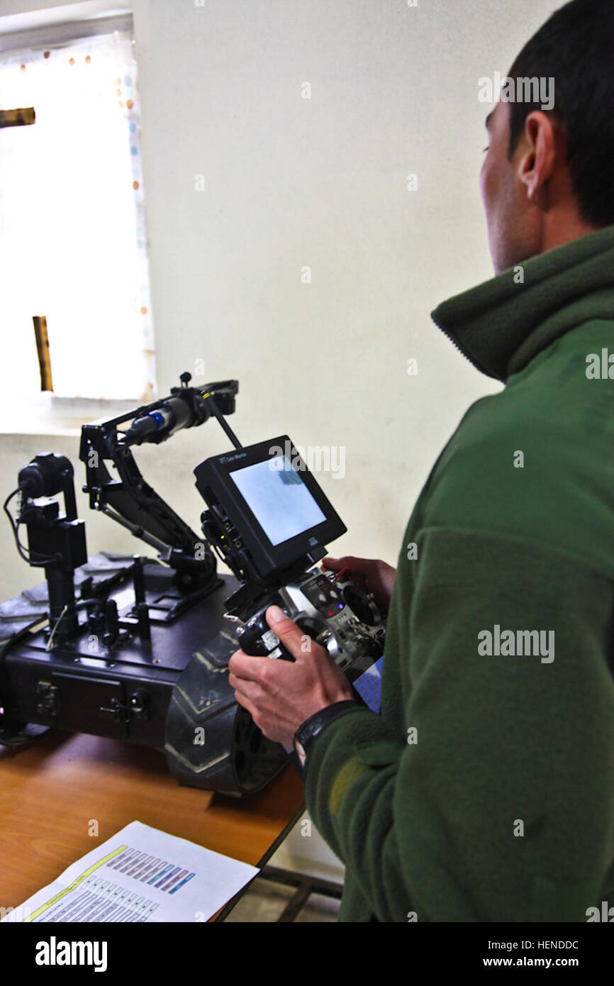 An Afghan National Army soldier of the 203rd Corps controls a remote