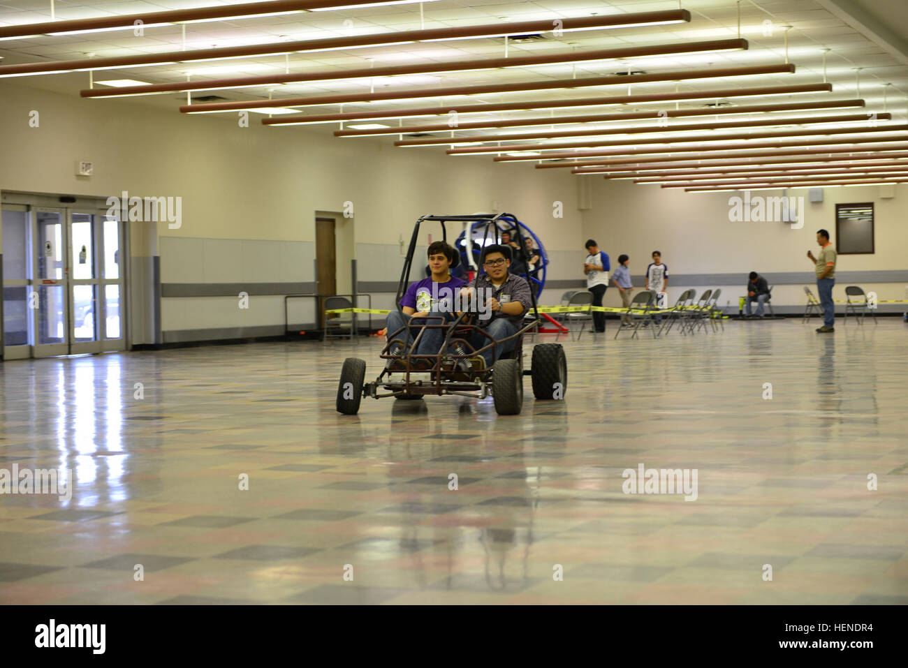 Javier Lopez, a sophomore from Harmony School of Innovation, takes his water powered go-kart for a test drive March 29, during the 5-STAR Innovation Cup STEM Showcase and Competition. Students armed with science spark Soldiers%%%%%%%%E2%%%%%%%%80%%%%%%%%99 interest 140329-A-WF334-898 Stock Photo