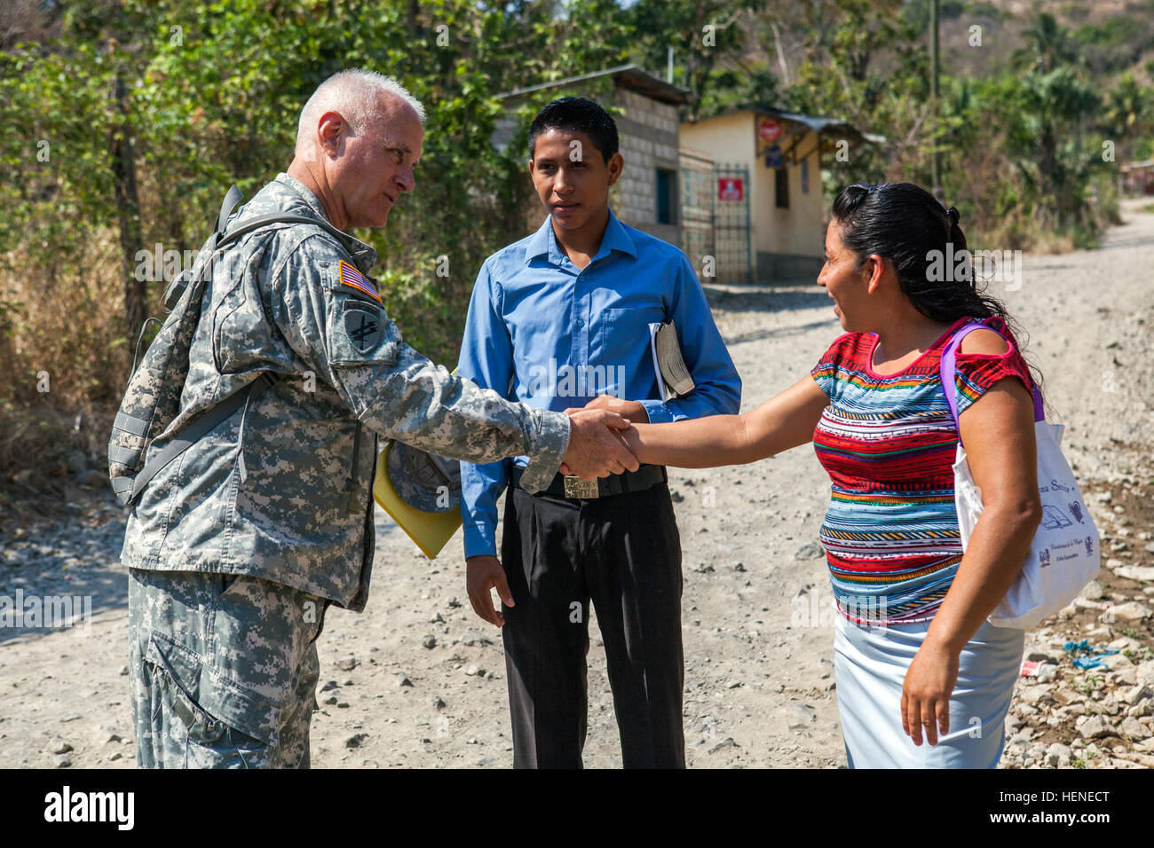 U.S. Army Master Sgt. John Barneson discusses an upcoming Medical Readiness Training Exercise with local villagers during Beyond the Horizon 2014, Zacapa, Guatemala, Apr. 12, 2014. Beyond the Horizon is an annual exercise that embraces the partnership between the United States and Guatemala, to provide focused humanitarian assistance through various medical, dental, and civic action programs. (U.S. Army photo by Staff Staff Sgt. Justin P. Morelli / Released) Beyond The Horizon 2014, Guatemala 140412-A-PP104-033 Stock Photo