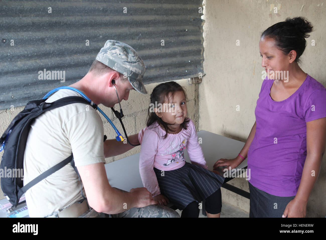 US Air Force Cpt. Charles Pace, assigned to 42nd Medical Group, examines a Guatemalan child during a Medical Readiness Training Exercise during Beyond the Horizon 2014, Zacapa, Guatemala, Apr. 21, 2014. Beyond the Horizon is an annual exercise that embraces the partnership between the United States and Guatemala, to provide focused humanitarian assistance through various medical, dental, and civic action programs. (U.S. Army photo by Spc. Gary Silverman)(Released) Beyond the Horizon 2014, Guatemala 140421-A-TO648-220 Stock Photo