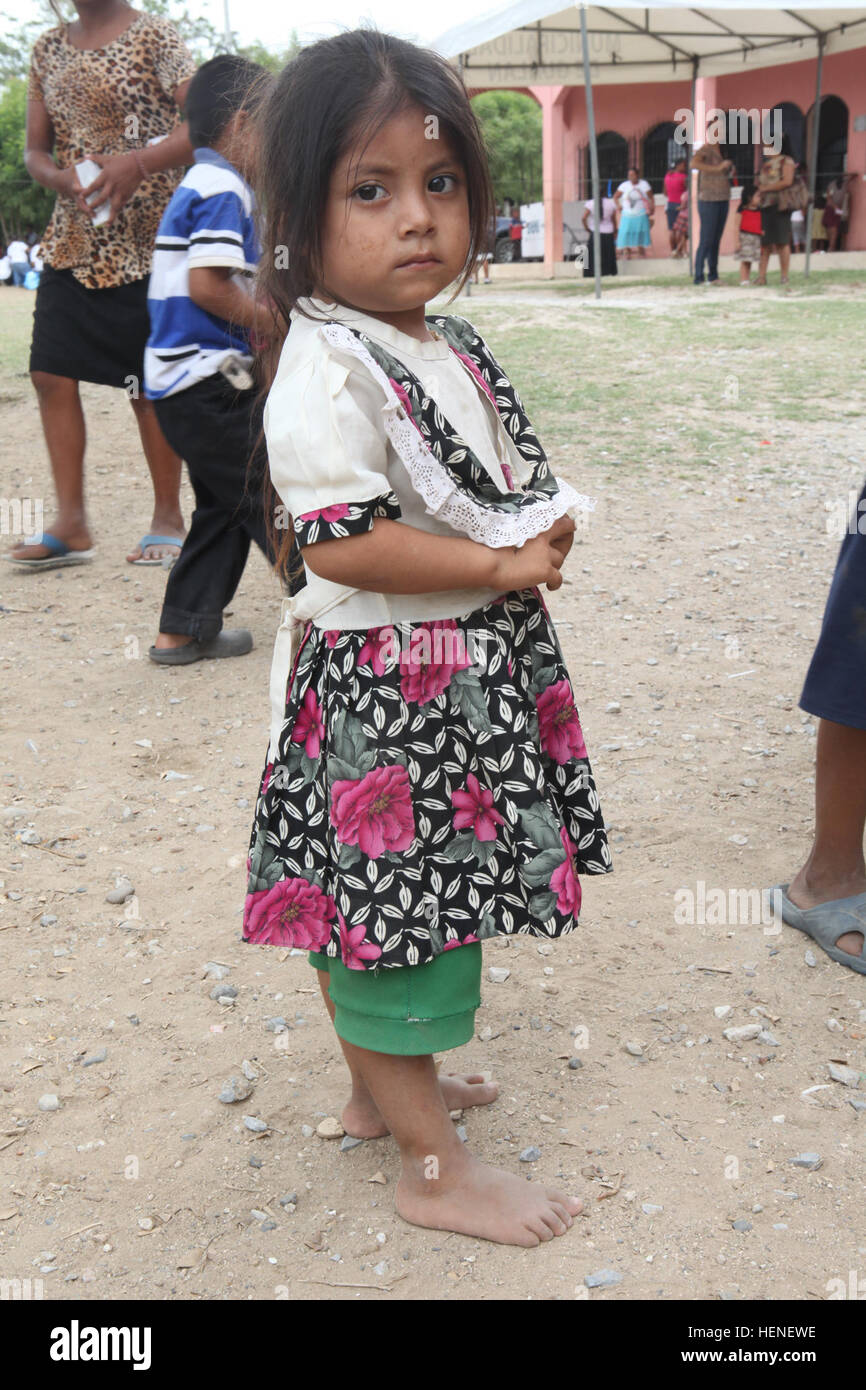 A Guatemalan child waits to be seen by US Air Force doctors during a Medical Readiness Training Exercise during Beyond the Horizon 2014, Zacapa, Guatemala, Apr. 22, 2014. Beyond the Horizon is an annual exercise that embraces the partnership between the United States and Guatemala, to provide focused humanitarian assistance through various medical, dental, and civic action programs. (U.S. Army photo by Spc. Gary Silverman)(Released) Beyond the Horizon 2014, Guatemala 140422-A-TO648-547 Stock Photo