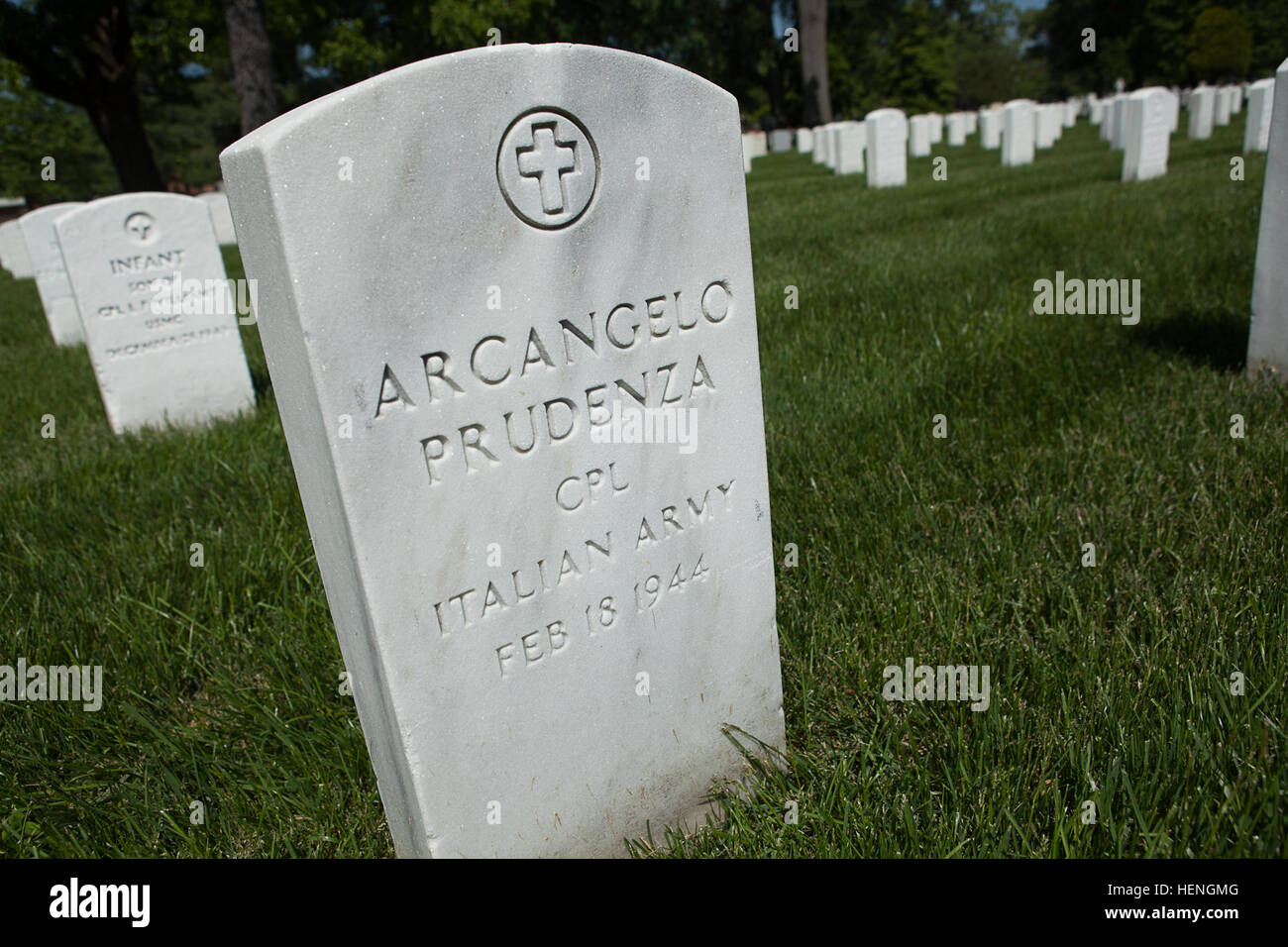 The grave of Italian Army Cpl. Arcangelo Prudenza, died Feb 18, 1944, is located in Section 15 of Arlington National Cemetery May 19,2014. Prudenza is identified as a prisoner of war on ANC’s website. (Joint Base Myer-Henderson Hall PAO photo by Rachel Larue) The mysteries of Section 15 140519-A-DZ999-857 Stock Photo