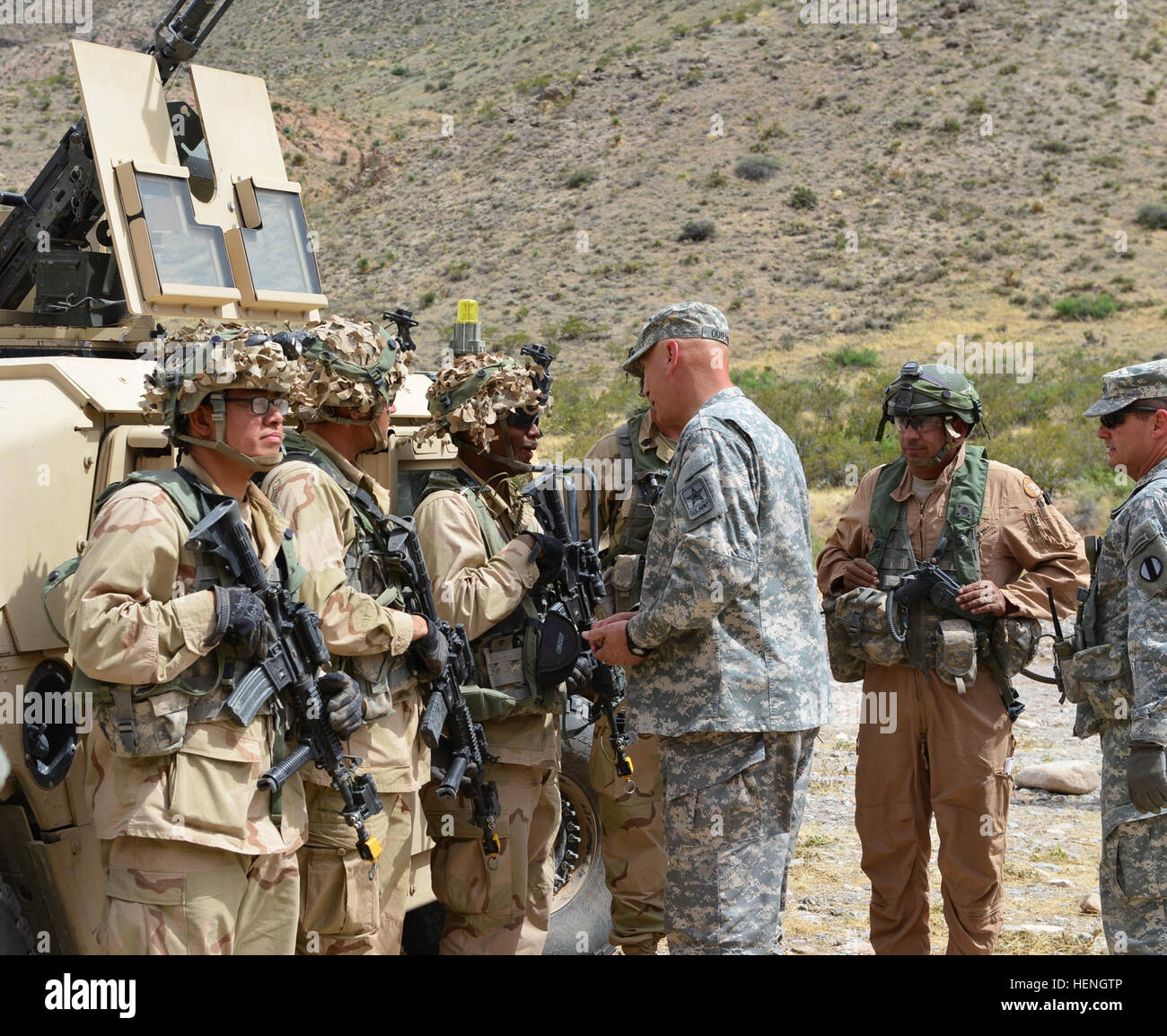 Chief of Staff of the Army, Gen. Raymond Odierno, gives out coins to ...