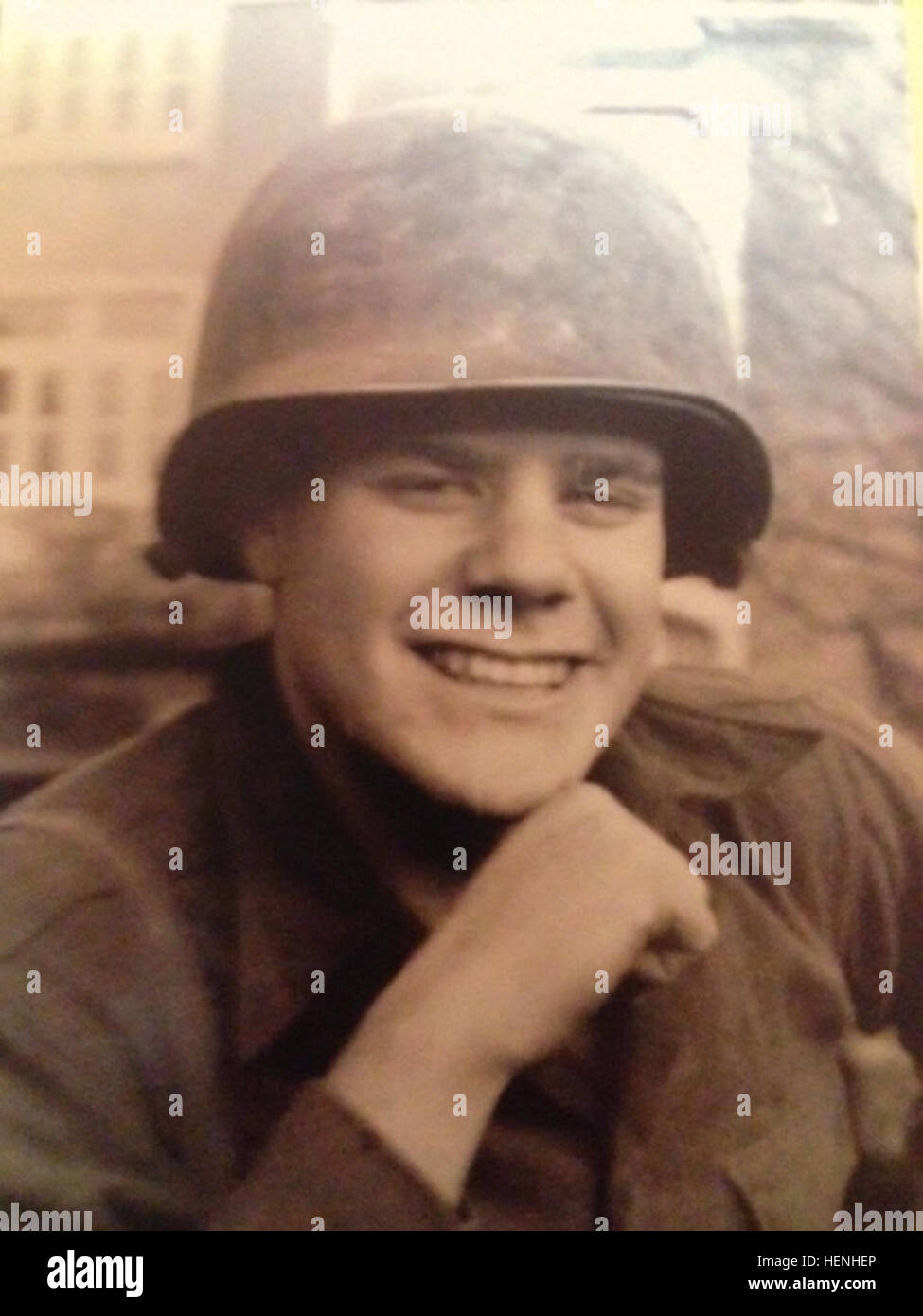 In this undated photo provided by Sgt. Jordan Rabaste of the 1st Squadron (Airborne), 40th Cavalry, Rabaste's grandfather, Pfc. Robert Grant, poses for a photo somewhere in Europe during World War II. Grant came ashore at Omaha Beach on D+3 and fought with the 28th Infantry Division throughout Europe, receiving the Bronze Star Medal and Purple Heart for his actions during the Battle of the Bulge. Spartans return from Normandy 140529-A-GR997-272 Stock Photo