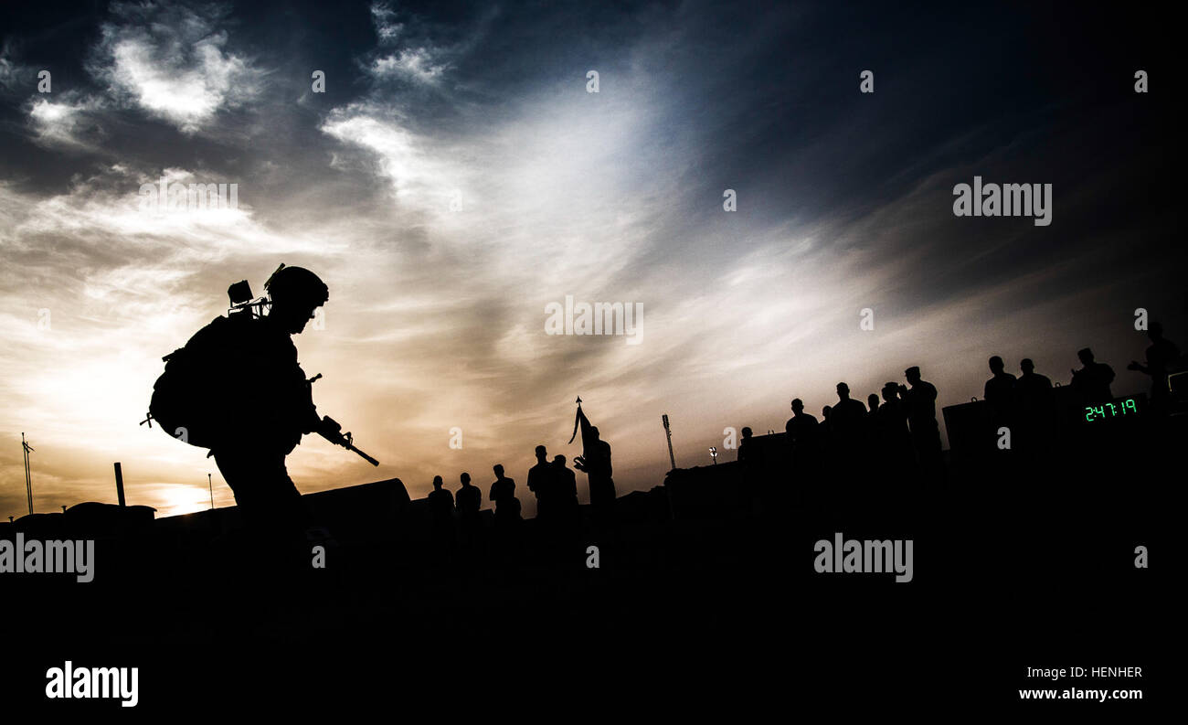 A Soldier completes a 12-mile ruck march at Camp Buehring, Kuwait ...