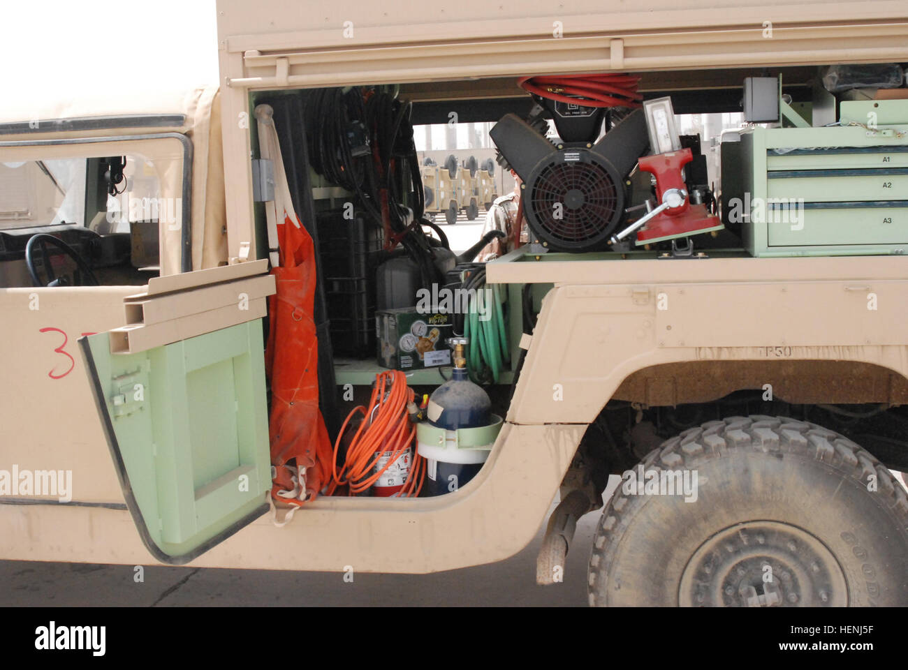 An Iraqi army shop equipment contact maintenance Humvee sits parked with dozens of other logistical support vehicles at the Old al Muthana vehicle warehouse in Baghdad, Iraq, March 26, 2008. This equipment was procured by the Ministry of Defence through the foreign military sales program. (U.S. Army photo by Capt. David F. Roy/Released) Iraqi army shop equipment contact maintenance Humvee Stock Photo