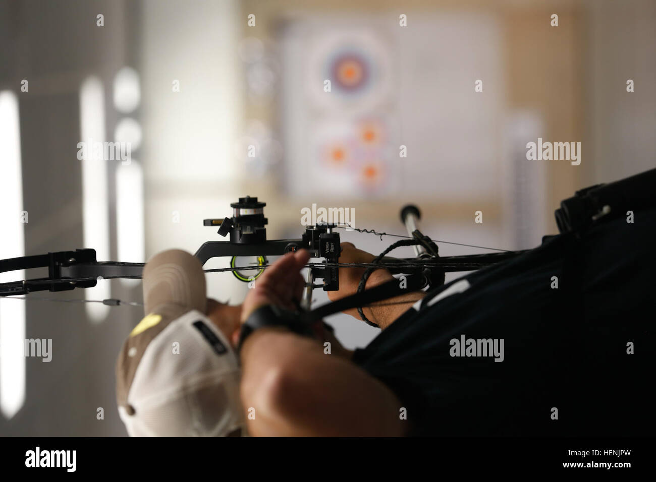 U.S. Army Veteran Capt. Frank Barroquiero, from Gainesville, Ga., aims