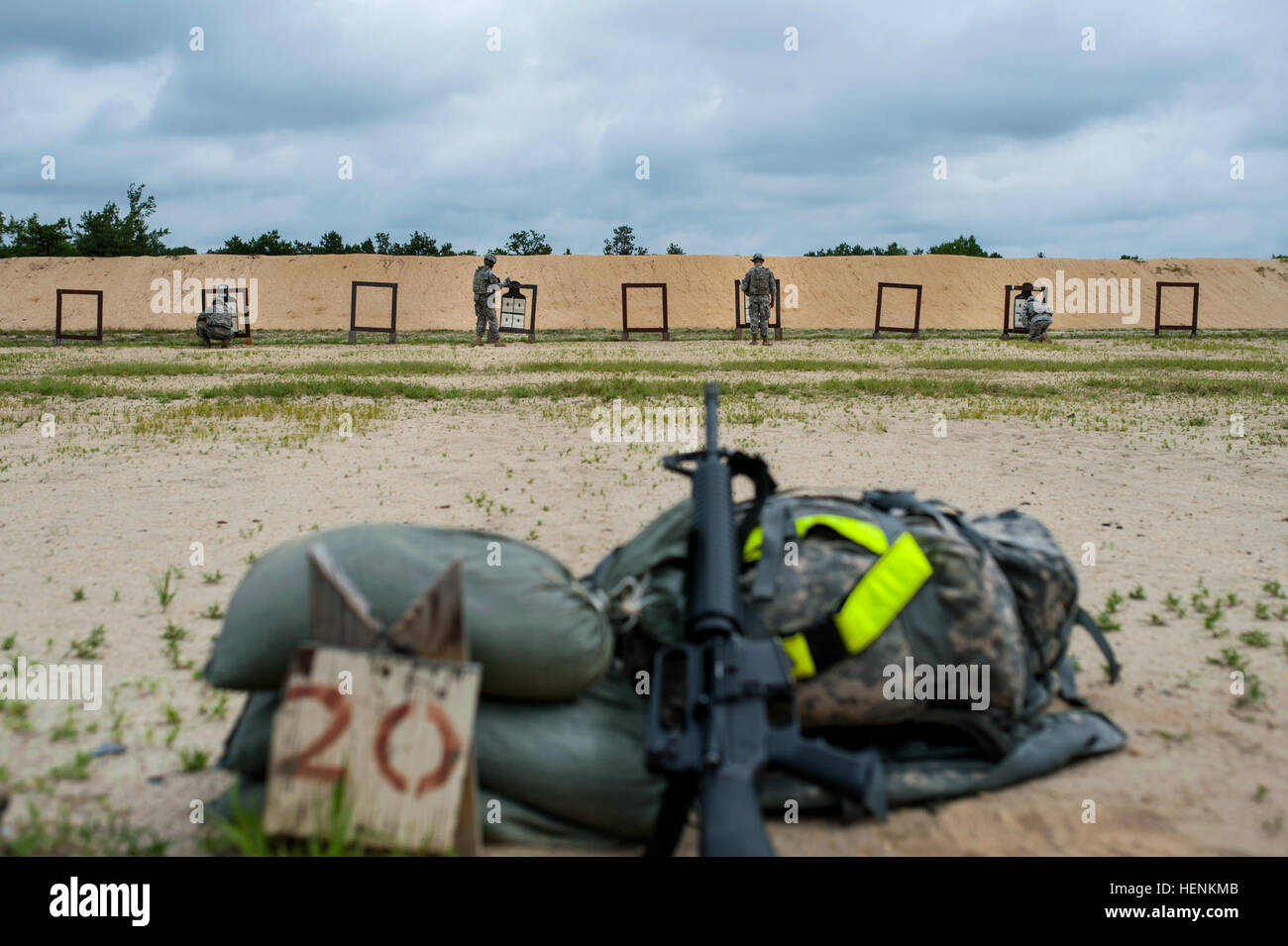 Soldiers check their zero targets on the M16 rifle range during the