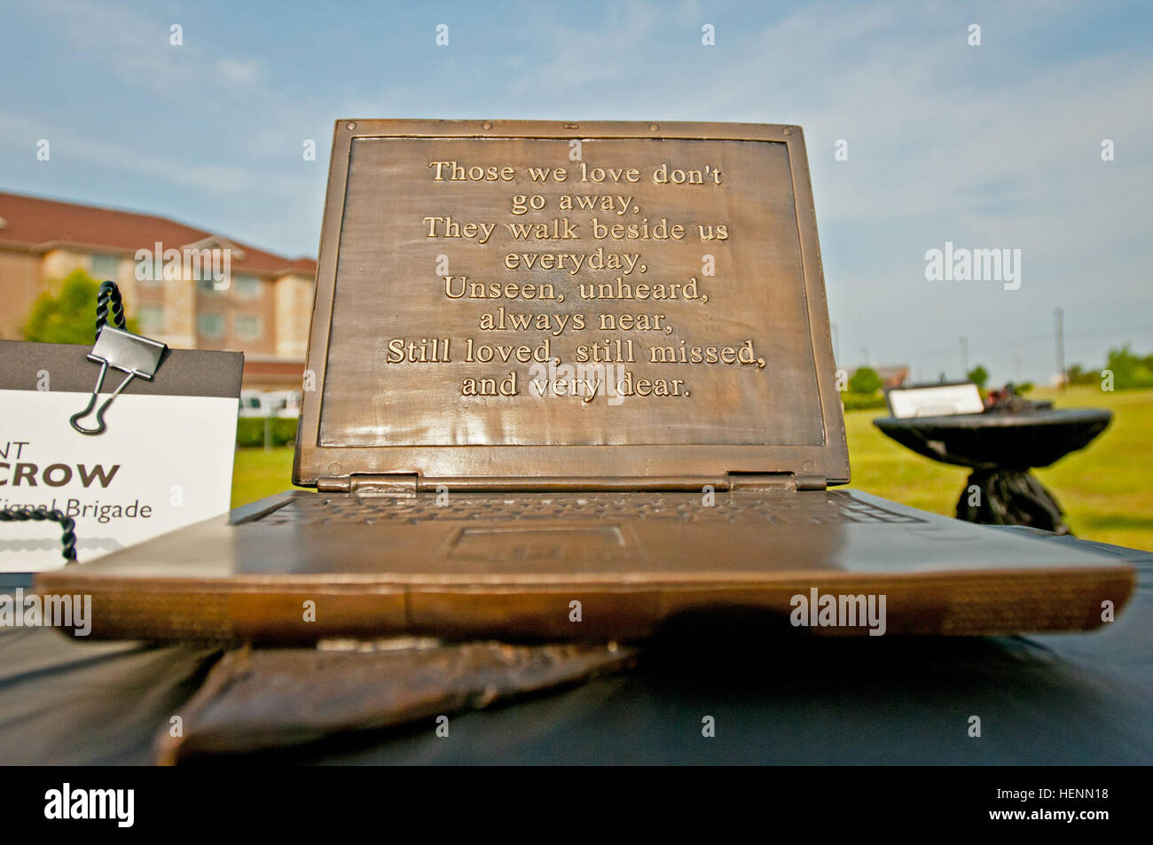 A message of comfort is etched onto the bronze screen of a sculpture July 22, 2014, created by Salado artist Troy Kelley to honor U.S. Army Staff Sgt. Justin M. Decrow, of the 62nd Signal Battalion, 11th Signal Brigade, who was killed in the Nov. 5, 2009, Fort Hood shooting. Kelley designed sculptures for each of the 13 victims who were killed in the tragedy using objects that were dear to them. The sculptures were displayed at a groundbreaking ceremony for the Nov. 5, 2009, Fort Hood Shooting memorial at the Killeen Civic Center. (U.S. Army photo by Sgt. Ken Scar, 7th Mobile Public Affairs De Stock Photo