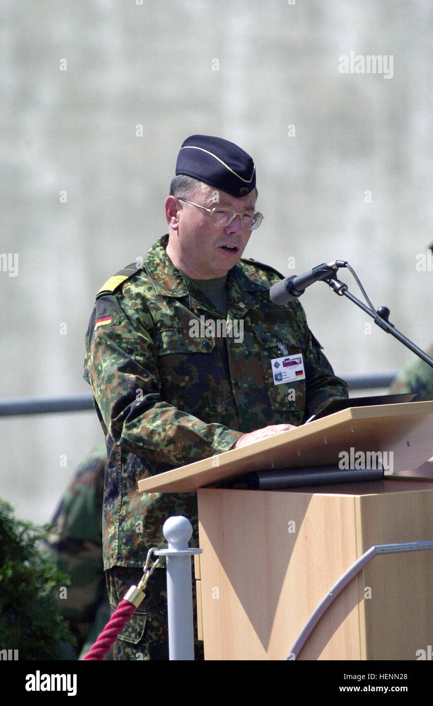 German Armed Forces Vice Admiral Bernd Heise, Chief of the Joint Support Service,  addresses the participants of Exercise COMBINED ENDEAVOR 2001, during the closing ceremonies.  This marks the end of Combined Endeavor 2001 in Lager Aulenbach, Germany.  Sponsored by US European Command and hosted by Germany, the exercise is held annually to test and document the interoperability of dozens of countires and NATO.  This is the largest communications and information systems exercise in the world, 37 countries participated this year. Bernd Heise 2001 Stock Photo