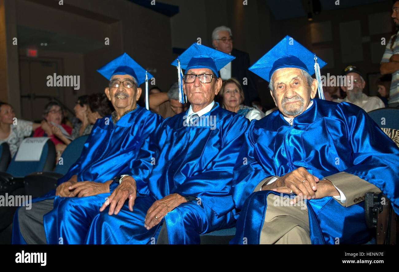 From left: Ricardo Palacios, Alex Rivas and Angel Ponce await the presentation of their high school diplomas at a graduation ceremony held at Bowie High School, El Paso, Texas, July 25, 2014. The WWII veterans were all members of Company E, 2nd Battalion, 141st Infantry Regiment of the 36th Texas Division, 5th  Army. (U.S. Army photo by Sgt. Jarred Woods, 16th Mobile Public Affairs Detachment) WWII veterans receive long awaited honor 140725-A-ZA744-018 Stock Photo