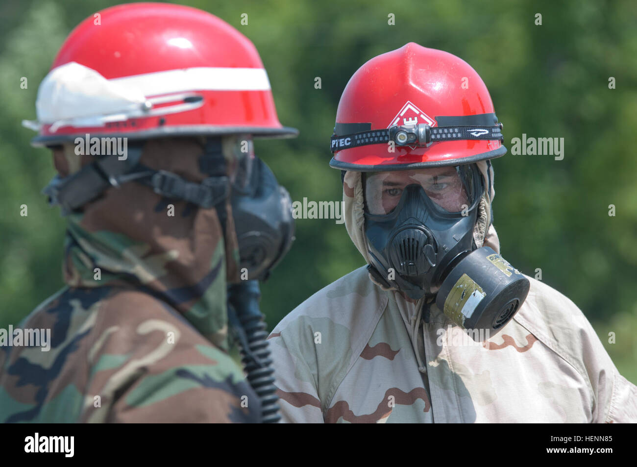 Soldiers of the 11th Engineer Battalion, Fort Benning, Ga., evacuate survivors of a nuclear blast, escorting them to a decontamination zone to receive medical treatment during Vibrant Response, a training exercise held at the Muscatatuck Urban Training Complex, Ind., July 24, 2014. Vibrant Response is a major field training exercise conducted by the U.S. Northern Command and led by U.S. Army North. Approximately 5,000 service members and civilians from the military and other federal and state agencies throughout the country are training to respond to a catastrophic domestic incident. As a comp Stock Photo