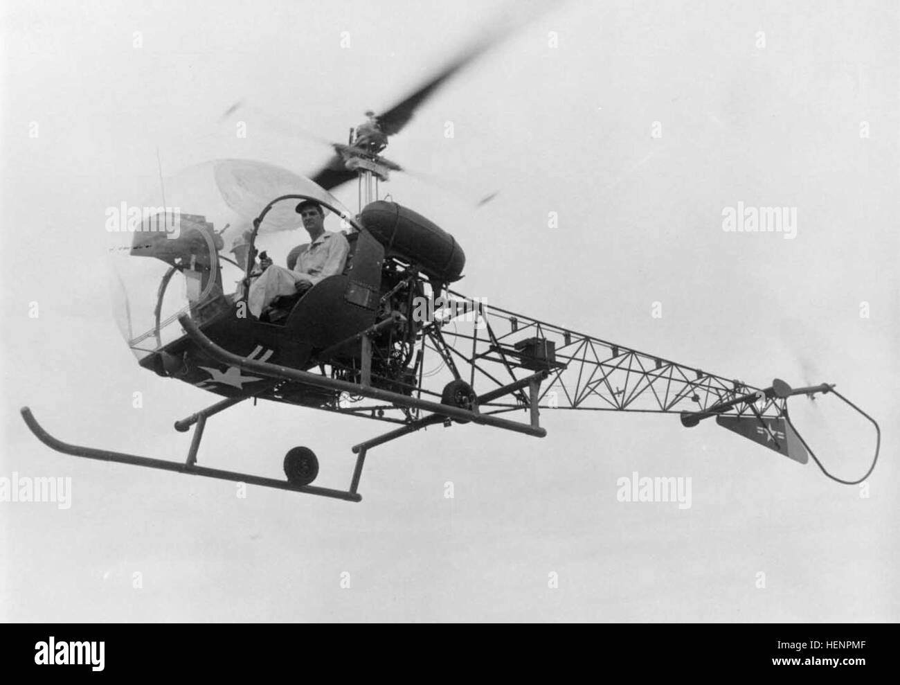 Bell 47-OH-13 inflight bw Stock Photo