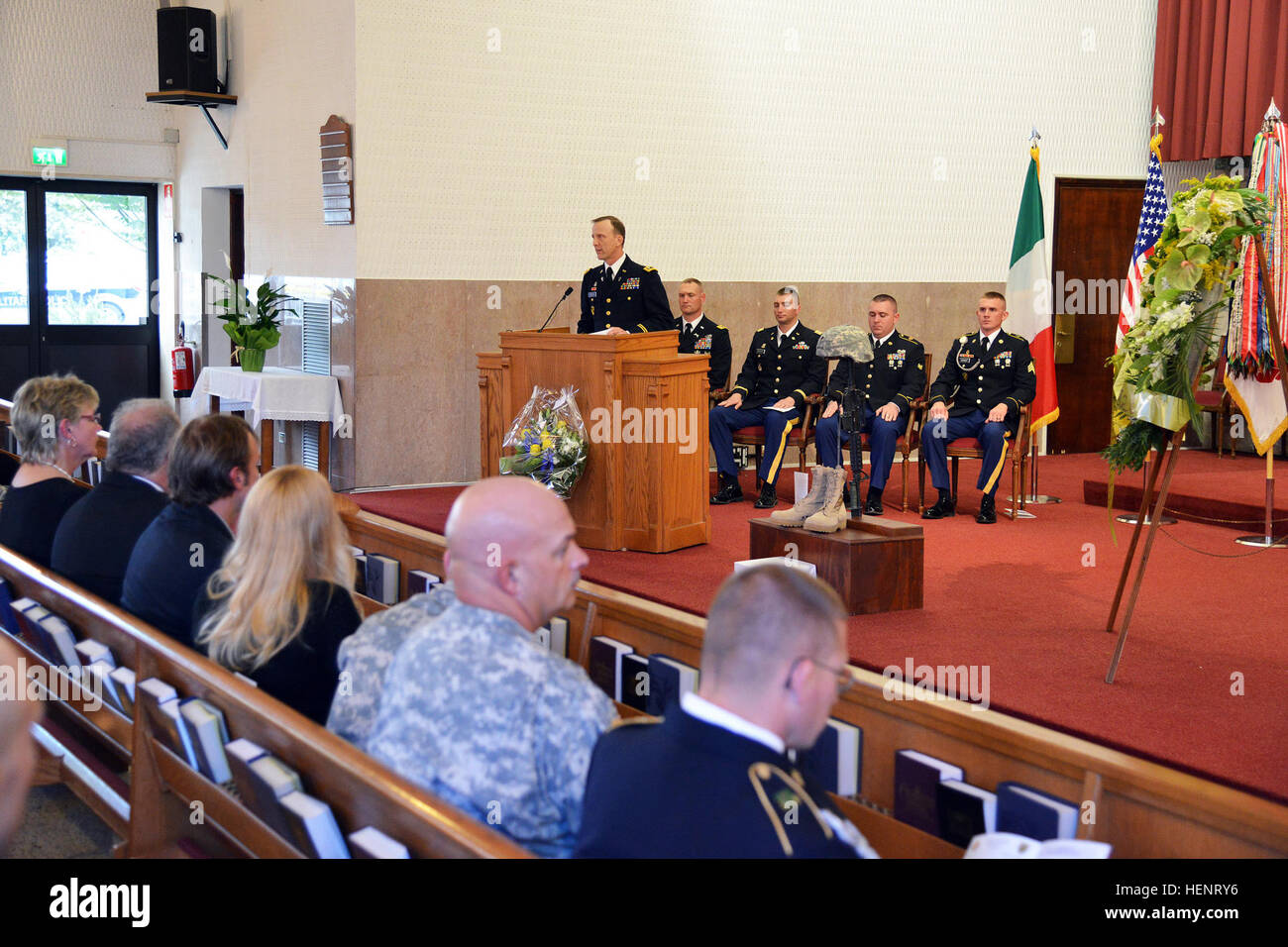 Chaplain Lt. Col. Peter Ferris gives an invocation for Soldiers and friends of the 464th Military Police Platoon during a memorial service for Spc. Harley Henry Reynolds, who died Sept. 6 from injuries sustained in a motorcycle accident, Caserma Ederle, Vicenza, Italy, Sept. 12, 2014. (U.S. Army photo by Visual Information Spc. Paolo Bovo) Memorial ceremony for Spc. Harley Henry Reynolds 140912-A-JM436-076 Stock Photo