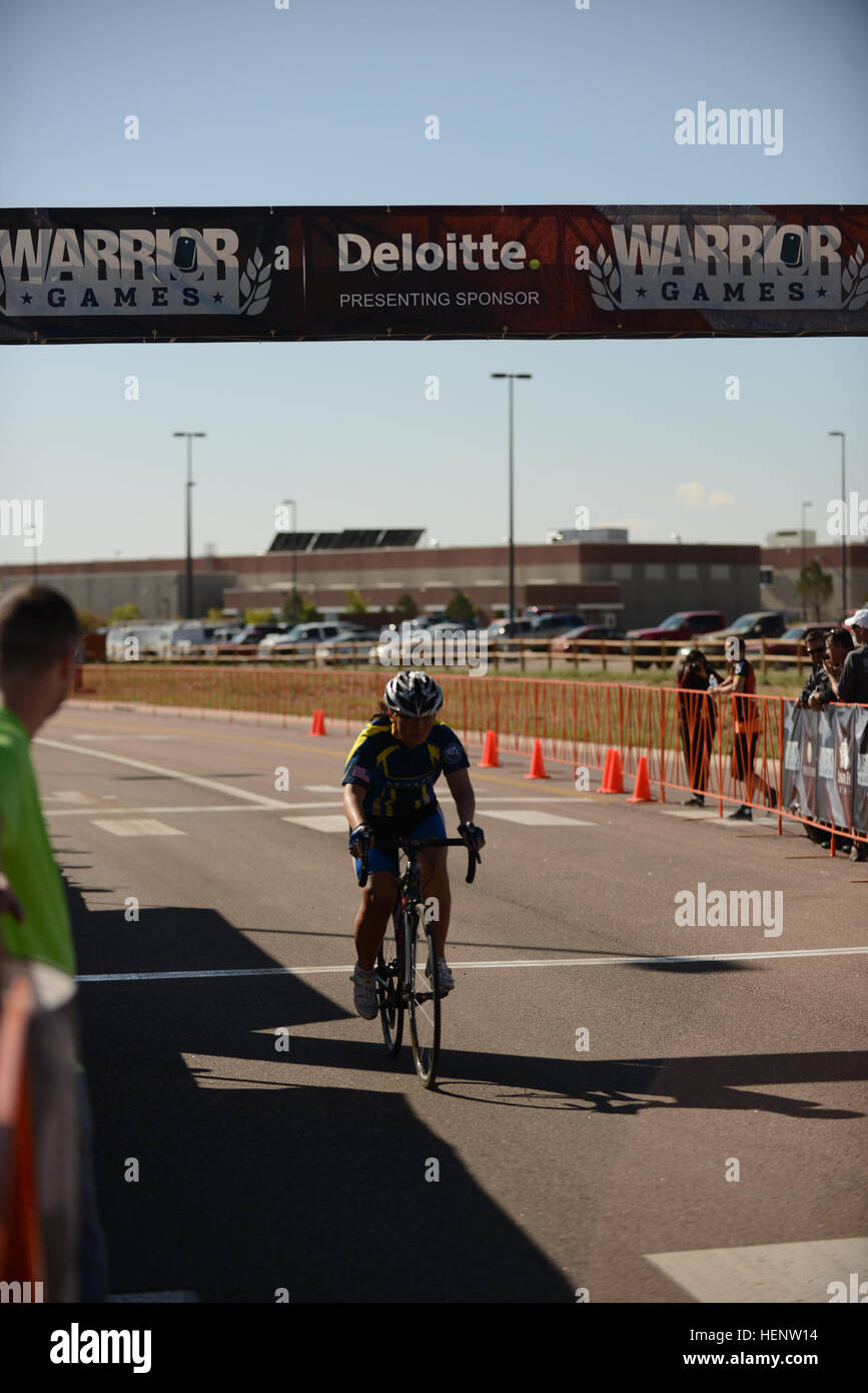 Competitors in the Women’s Open Cycle prepare to cross the finish line ...