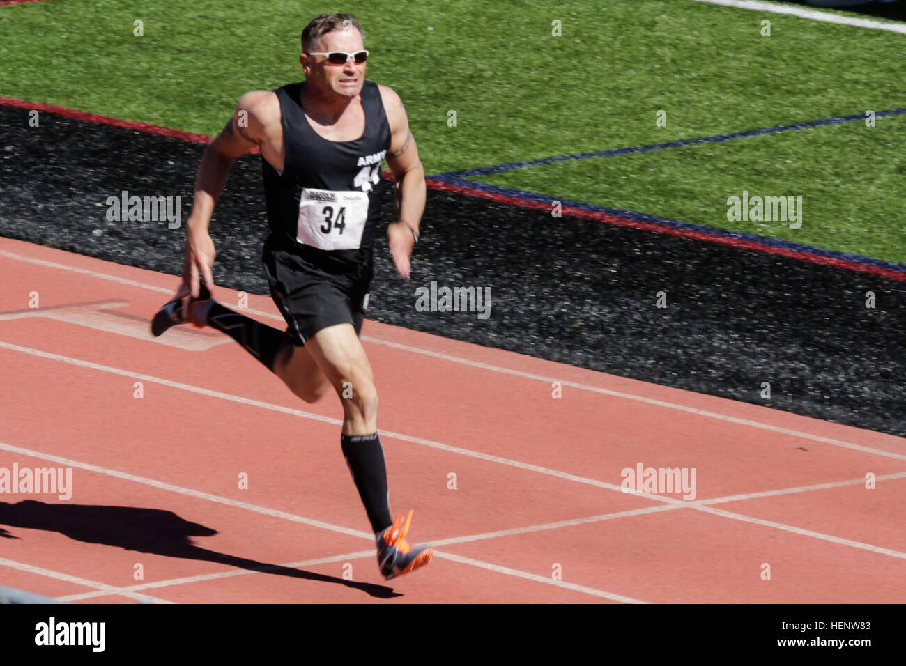 U.S. Army Staff Sgt. Ollie Knowland, San Antonio, competes in the track