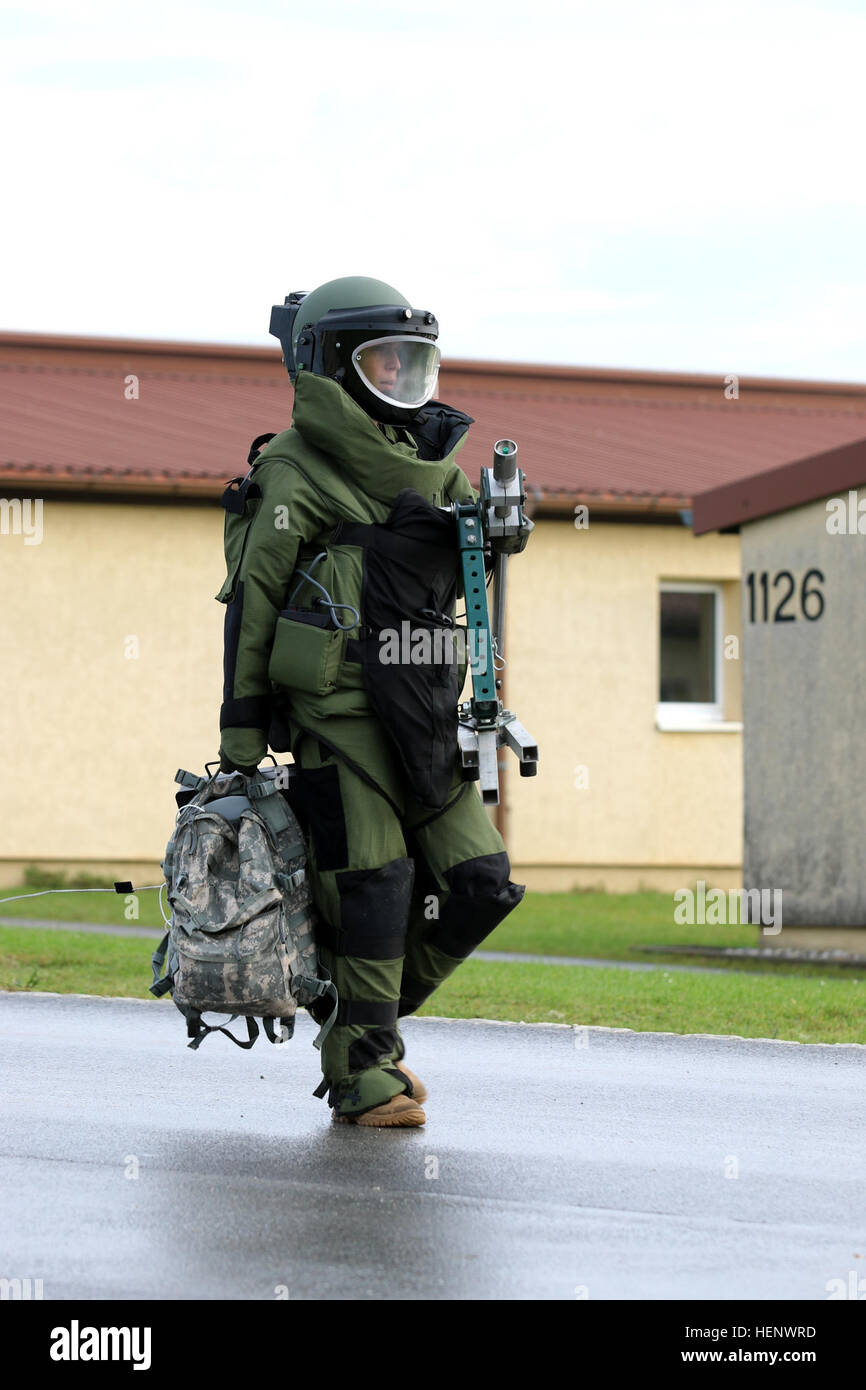 Staff Sgt. Jared Kotara, an explosive ordnance disposal specialist from San  Antonio, Texas, with the 763rd Explosive Ordnance Disposal Company  stationed at Fort Leonard Wood, Mo., walks with his equipment to inspect