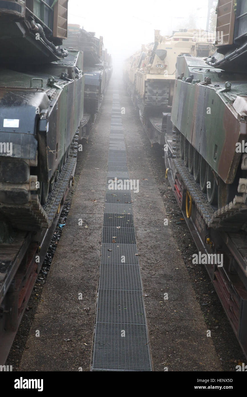 U.S. Army M1A2 Abrams tanks and M88A2 Hercules recovery vehicles arrive