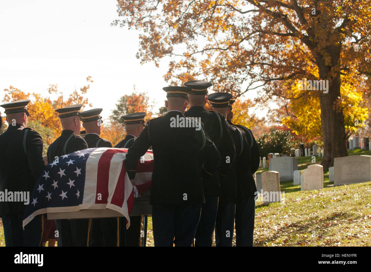 Retired Maj. Gen. Lee E. Surut is laid to rest by soldiers of the 3rd U.S. Infantry Regiment (The Old Guard), Nov. 12, 2014, in Arlington, Va. The two-star general had served for 40 years in the Untied States Army and is survived by his wife, three grown children, six grandchildren, and one great-grandchild. (U.S. Army Photo by Spc. Cody W. Torkelson) Final respects to retired Maj. Gen. Lee E. Surut Nov. 12, 2014 141112-A-FT656-578 Stock Photo