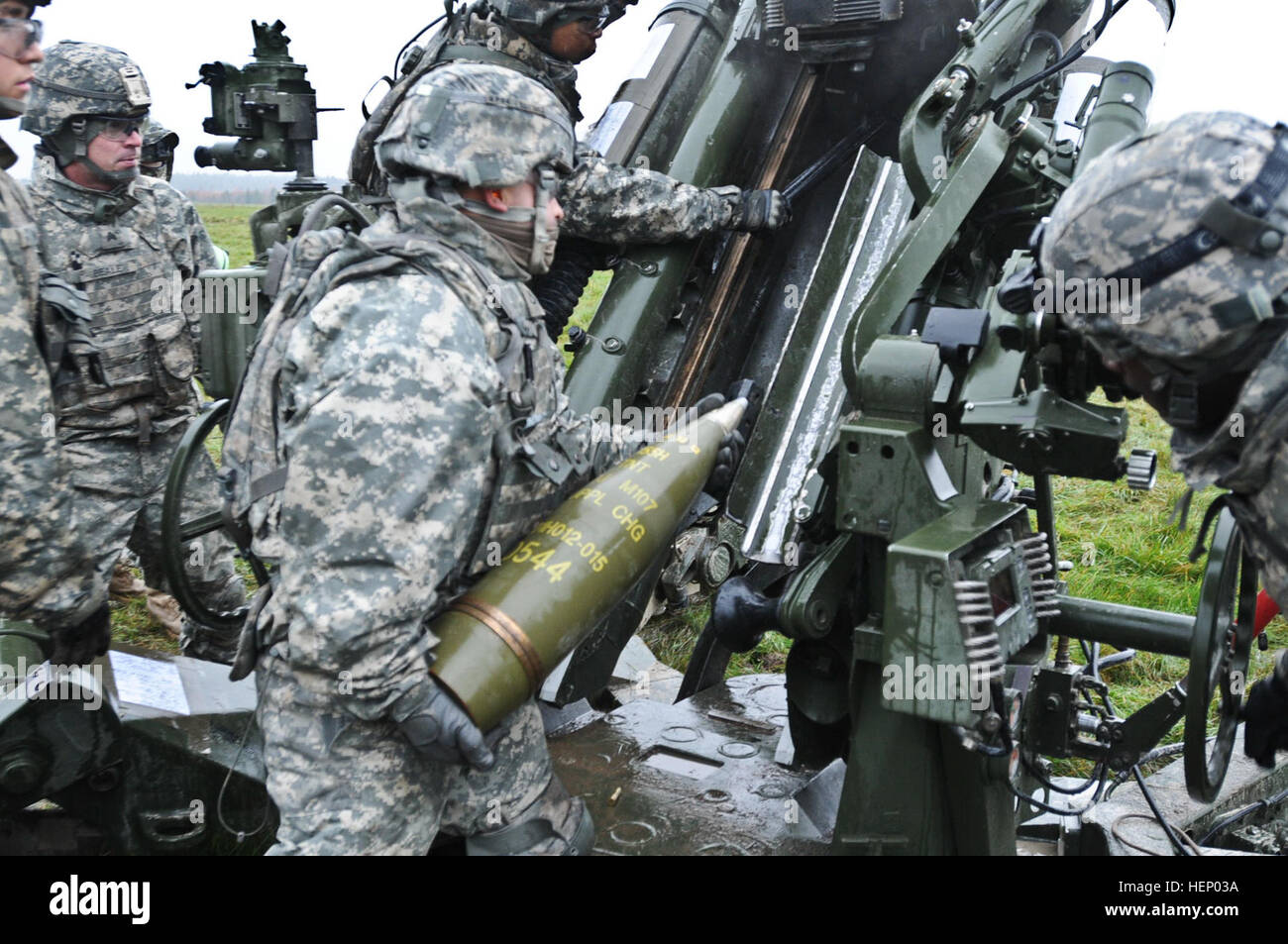 Howitzers Range Charlie Battery, 2nd Cavalry Regiment Dragoon troopers fire M777 ...