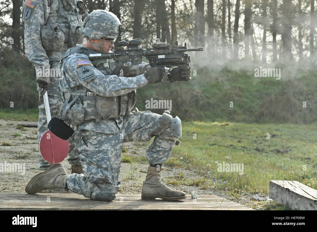 Dragoon Troopers assigned to 1st Squadron, 2nd Cavalry Regiment fire 40 mm practice rounds from a M320 grenade launcher during their grenade launcher qualification range at Grafenwoehr Training Area located near Rose Barracks, Germany, Nov. 25, 2014. Troopers familiarized themselves with the weapon prior to qualifying later on in the day. 1st Sqdn, 2 CR Grenade Launcher Range 141125-A-EM105-530 Stock Photo