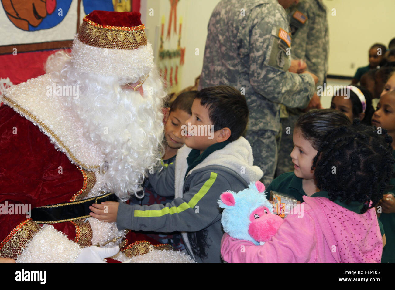 Children from West Homestead Elementary School tell Santa Claus what is