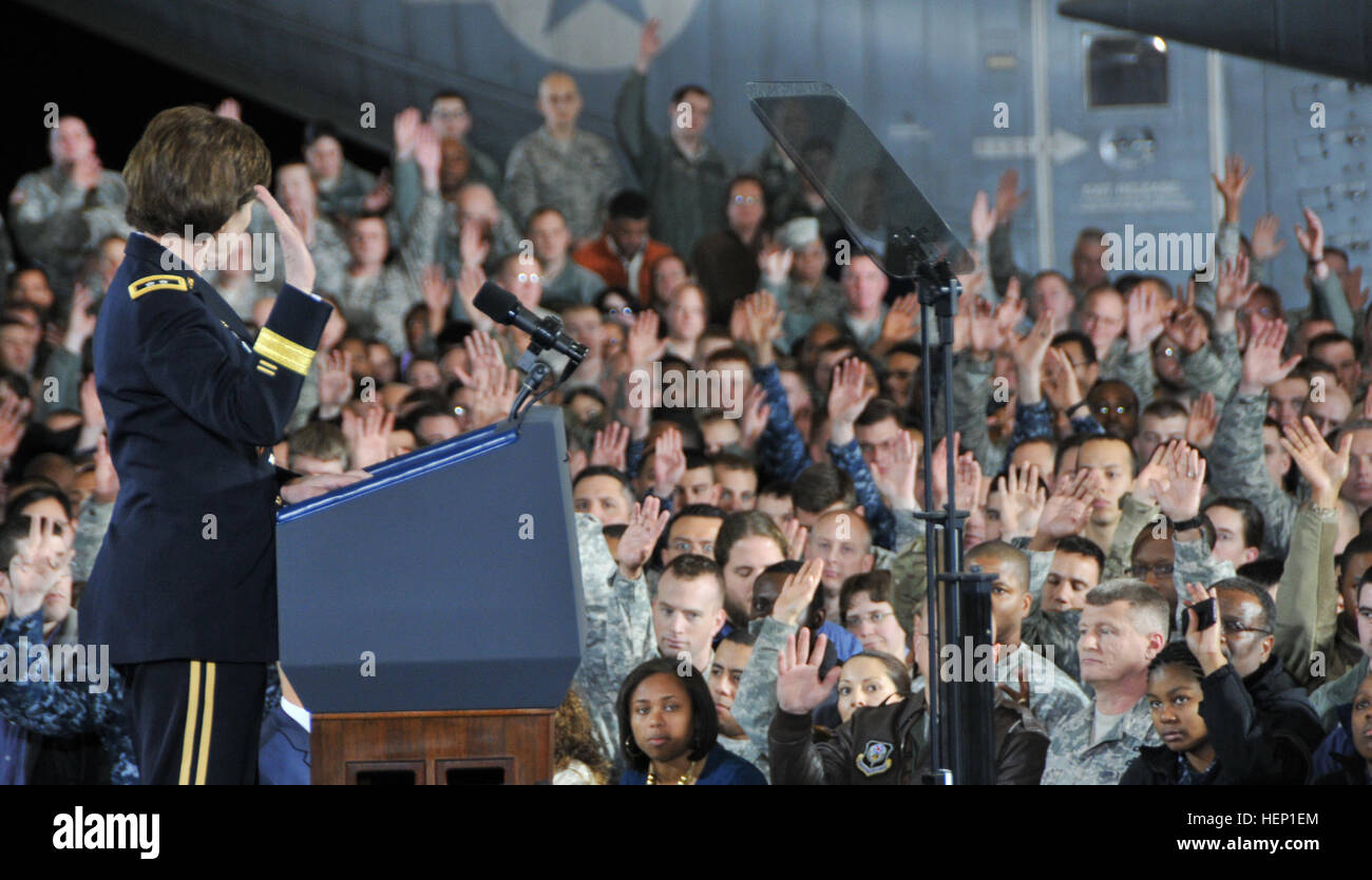 Maj. Gen. Margaret W. Boor, commanding general of the Army Reserve’s 99th Regional Support Command, takes a poll of previously deployed service members during a visit by U.S. President Barack Obama with an audience of 3,000 service members, military families, civic leaders and elected officials Dec. 15 inside a U.S. Marine hangar on Joint Base McGuire-Dix-Lakehurst, New Jersey. The purpose of the president’s visit to JB MDL was to thank troops for their service. Also speaking at the event was Maj. Gen. Rick Martin, commanding general of the U.S. Air Force Expeditionary Center. President Obama  Stock Photo