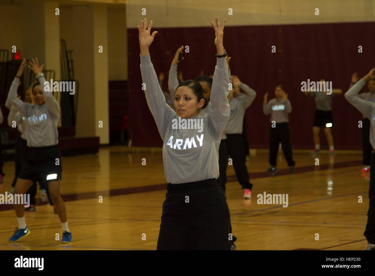 Female Soldiers from 2nd Combat Aviation Brigade perform dance during Zumba class on Jan. 8 at the Super Gym on Camp Humphreys. Female Mentorship Program 150108-A-AB345-001 Stock Photo