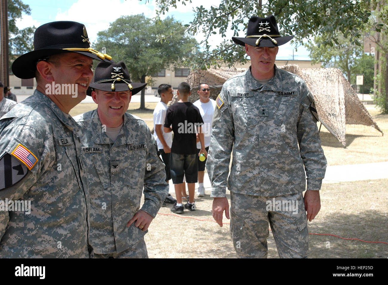 Major Daniel Bolger (right), the commanding general for 1st Cavalry Division, talks with Col. Douglas Gabram (center), commander the 1st Air Cavalry "Warrior" Brigade, 1st Cav. Div., and Command