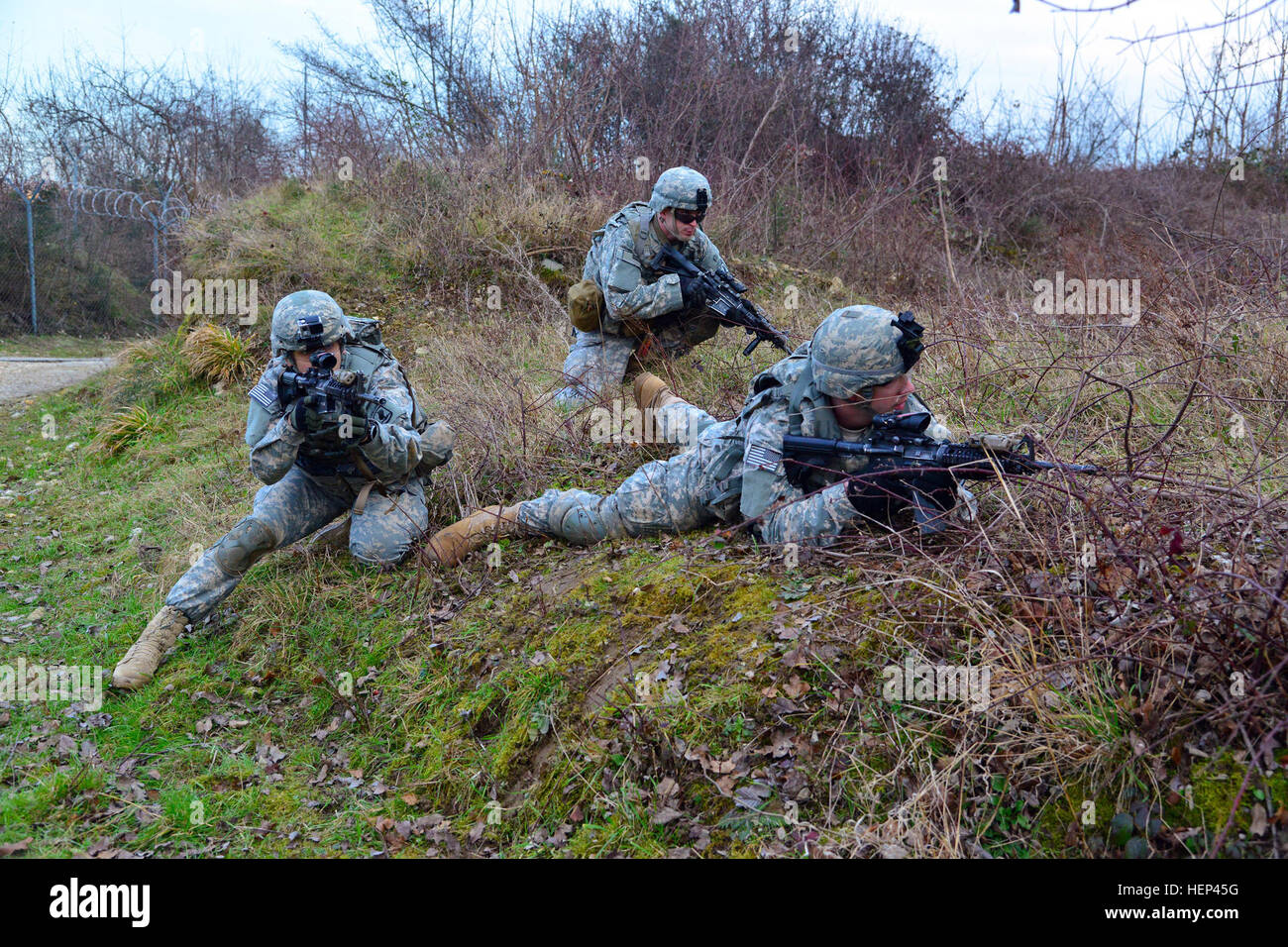 U.S. Army paratroopers from Company C, 1st Battalion, 503rd Infantry Regiment, 173rd Airborne Brigade, patrol a hilltop Feb. 4, 2015, during training at Longare Complex, Vicenza, Italy. The 173rd Airborne is the Army’s Contingency Response Force in Europe, capable of rapidly projecting forces in Europe, Africa and the Middle East. (U.S. Army photo by Visual Information Specialist Davide Dalla Massara/Released) 173rd Airborne Brigade day and night patrolling at Longare Complex, Vicenza, Italy 150204-A-DO858-203 Stock Photo