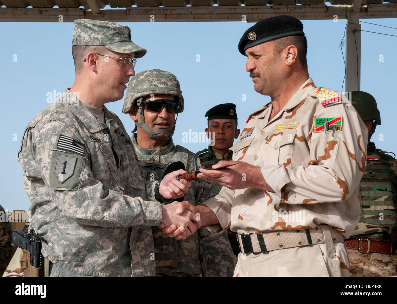 U.S. Army Lt. Col. Scott Allen, left, commander of 2nd Bn., 34th Armor ...