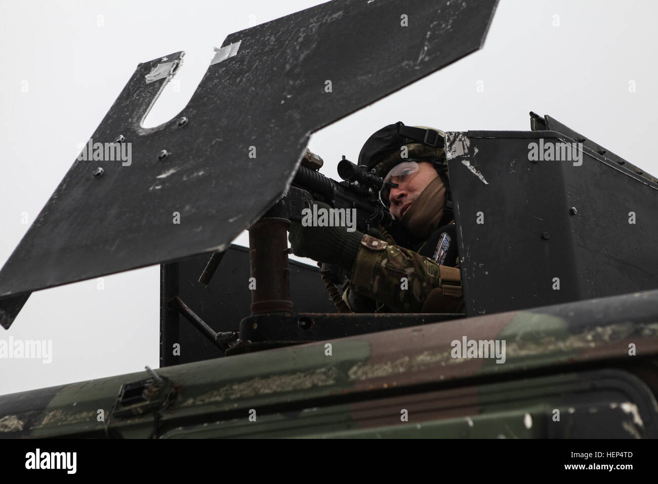 A Georgian soldier of Delta Company, 43rd Mechanized Infantry Battalion, 4th Mechanized Infantry Brigade provides security while conducting defensive operations training during a mission rehearsal exercise (MRE) at the Joint Multinational Readiness Center in Hohenfels, Germany, Feb. 14, 2015. Georgian armed forces and U.S. Marine Corps Security Cooperation Group are conducting the MRE from Feb. 2 to March 3, 2015, as part of the Georgian Deployment Program-Resolute Support Mission (GDP-RSM). The GDP-RSM, formerly the Georgian Deployment Program-International Security Assistance Force, is a pro Stock Photo